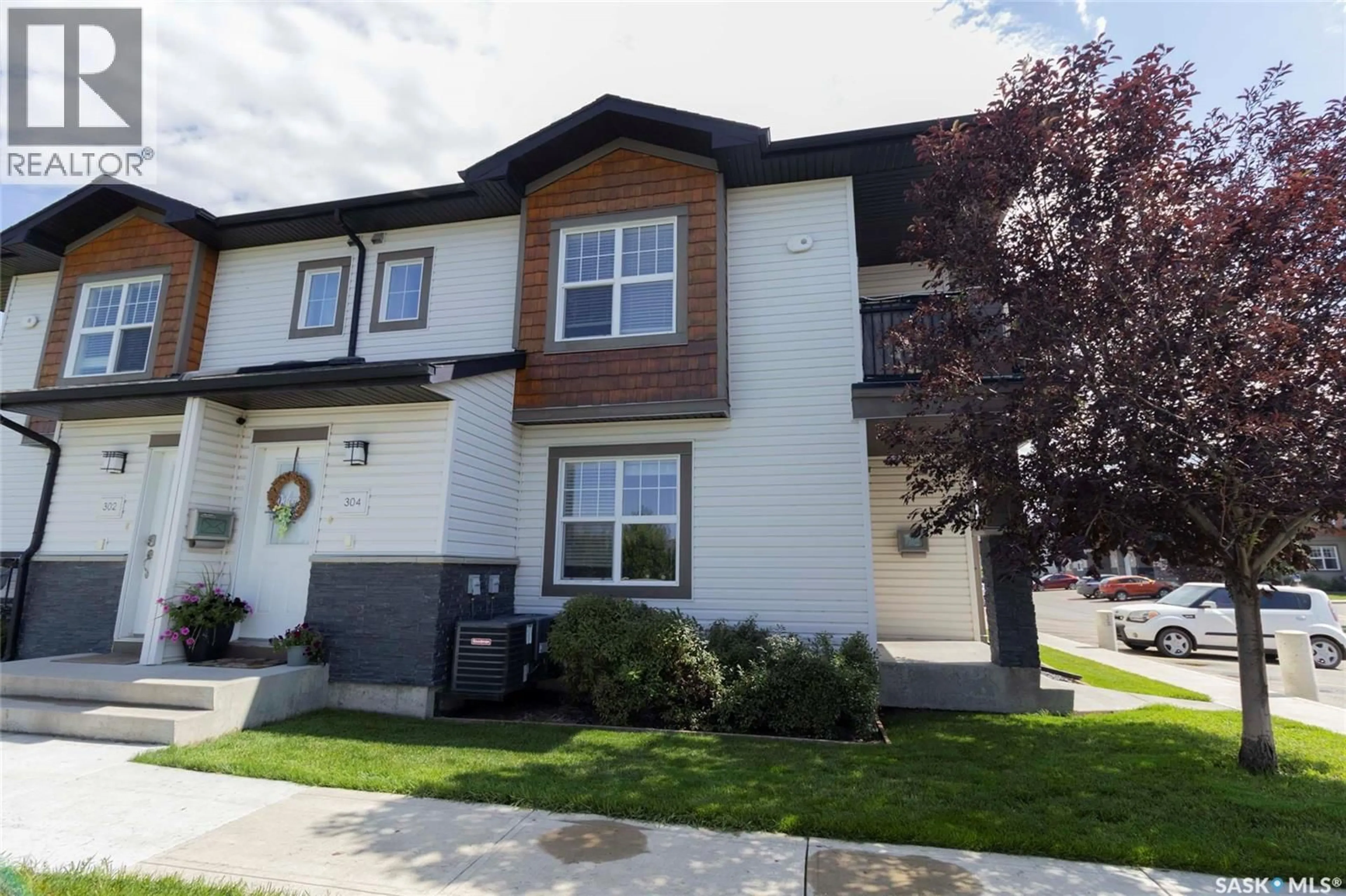 Home with vinyl exterior material, street for 1015 - 304 PATRICK CRESCENT, Saskatoon Saskatchewan S7M0M3
