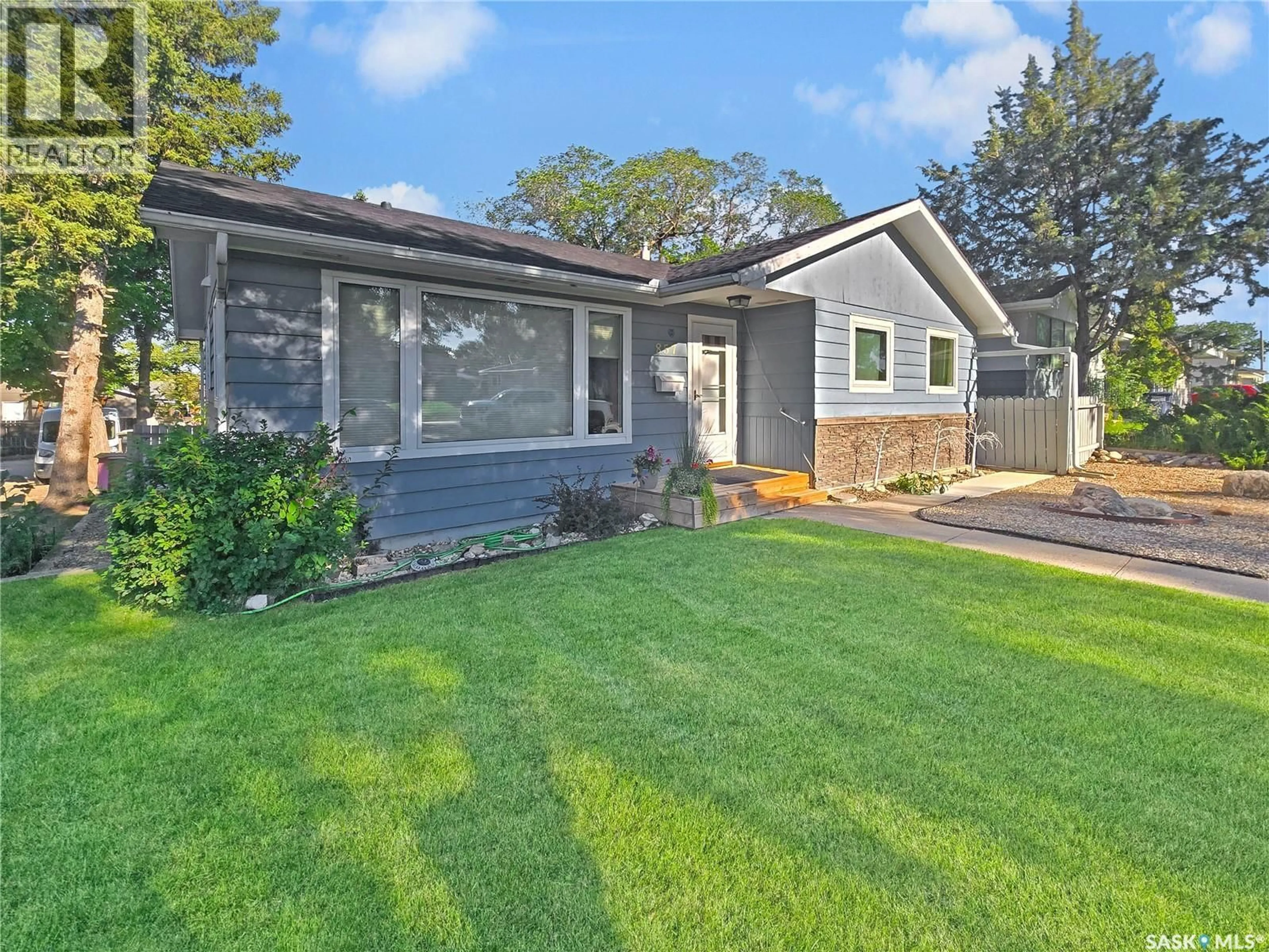 Home with vinyl exterior material, street for 857 10TH AVENUE, Swift Current Saskatchewan S9H2T6