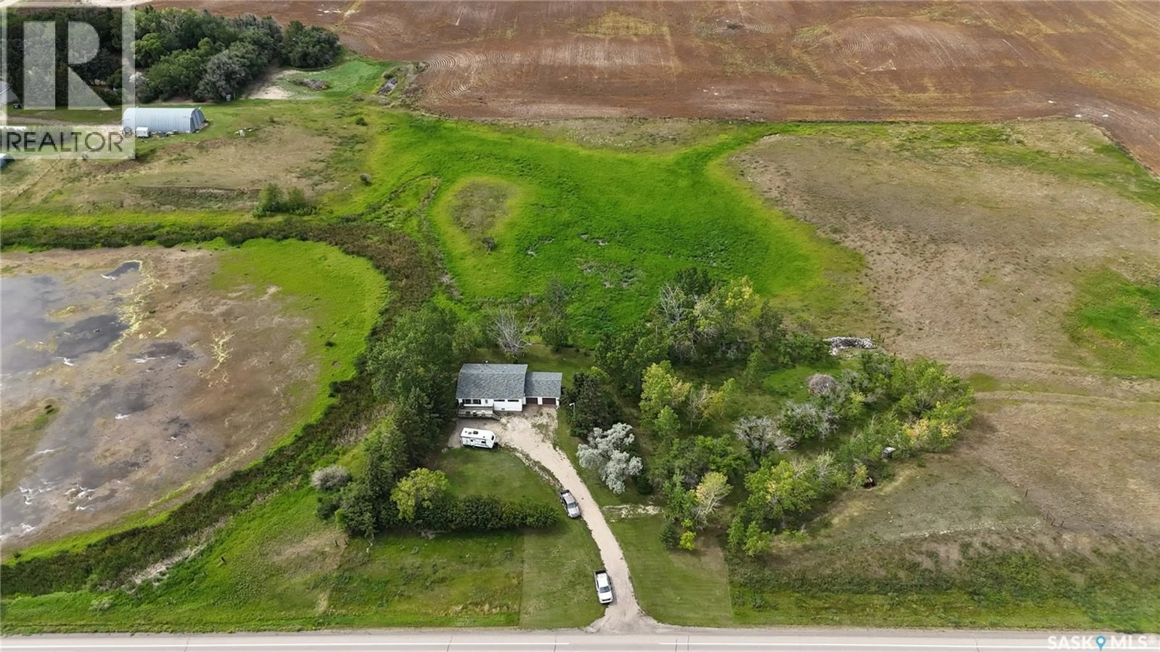 A pic from outside/outdoor area/front of a property/back of a property/a pic from drone, unknown for 4 HIGHWAY NORTH ACREAGE, Saskatchewan Landing Rm No.167 Saskatchewan S0N2P0