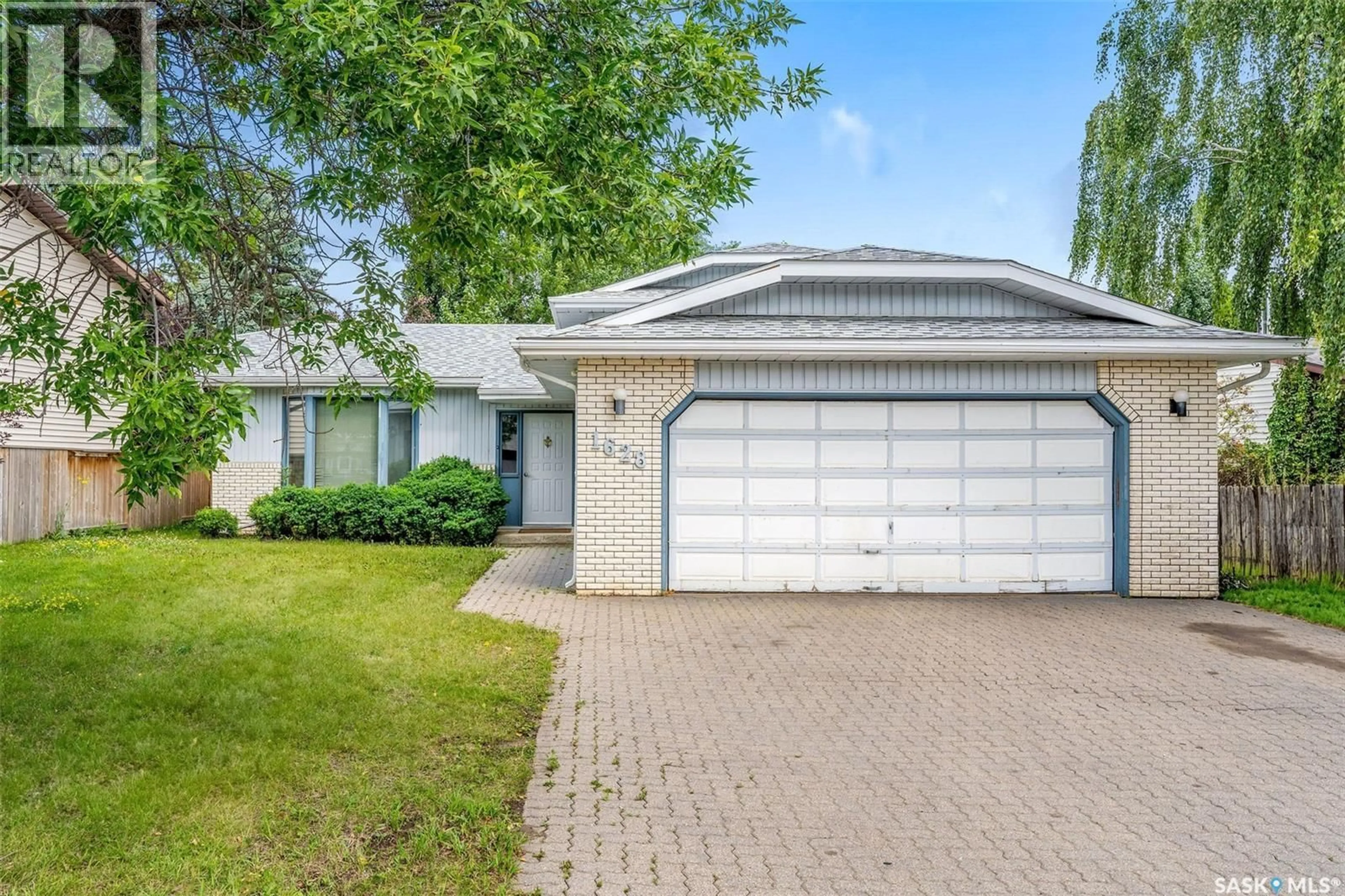 Home with vinyl exterior material, street for 1628 BARTON DRIVE, Prince Albert Saskatchewan S6V7P5
