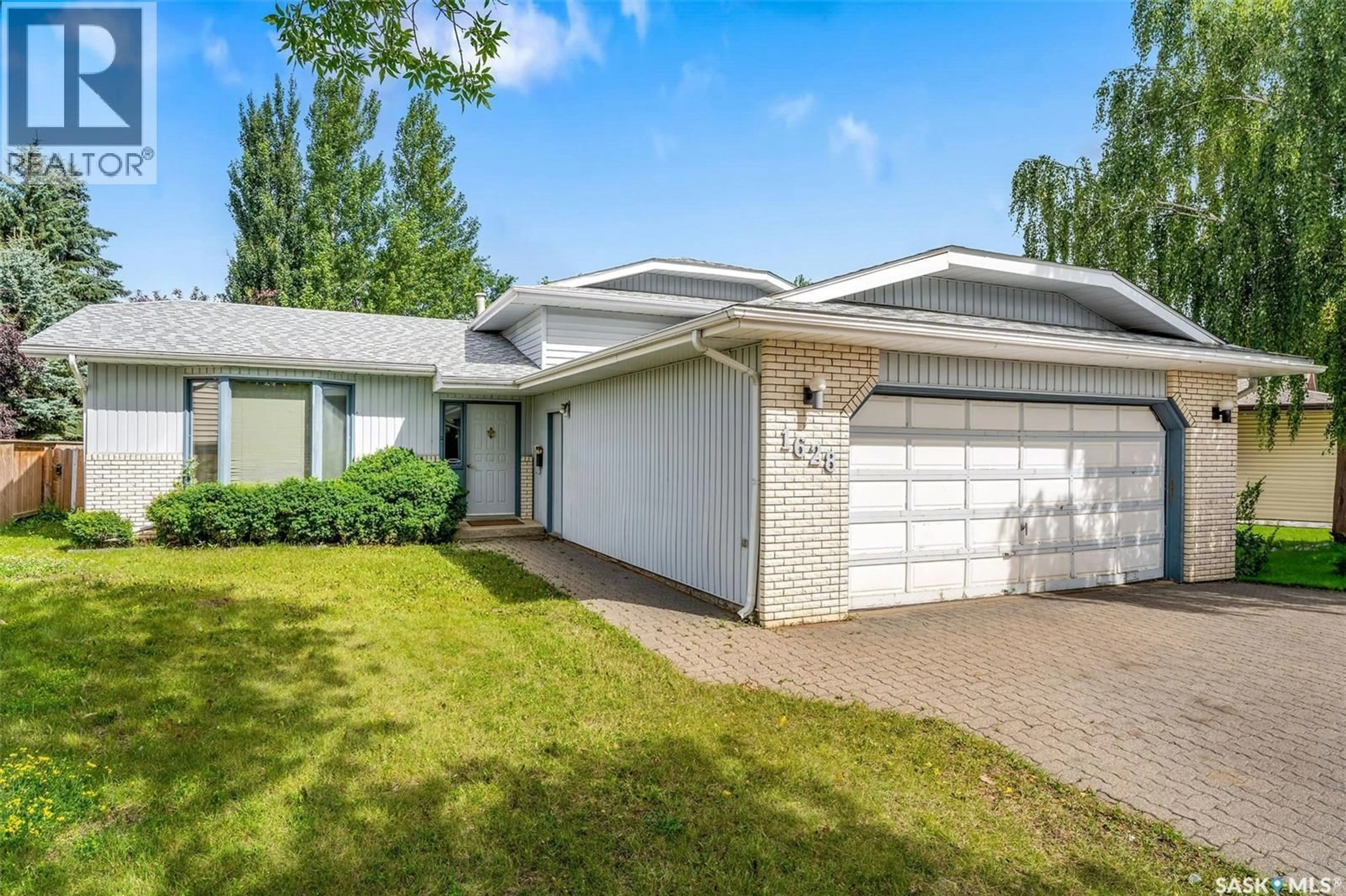 Home with vinyl exterior material, street for 1628 BARTON DRIVE, Prince Albert Saskatchewan S6V7P5