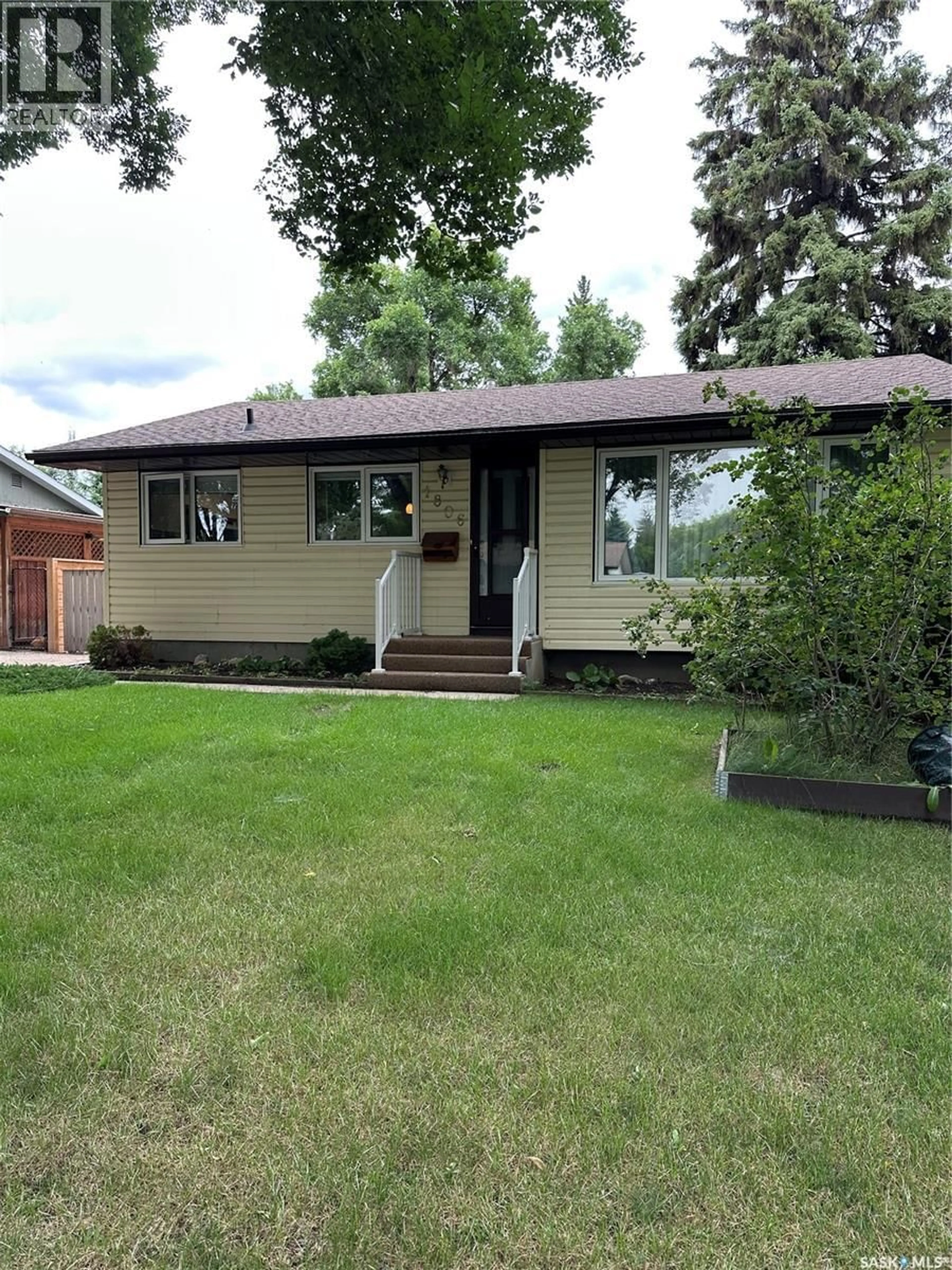 Home with vinyl exterior material, street for 1806 EASTHILL, Saskatoon Saskatchewan S7J3C1