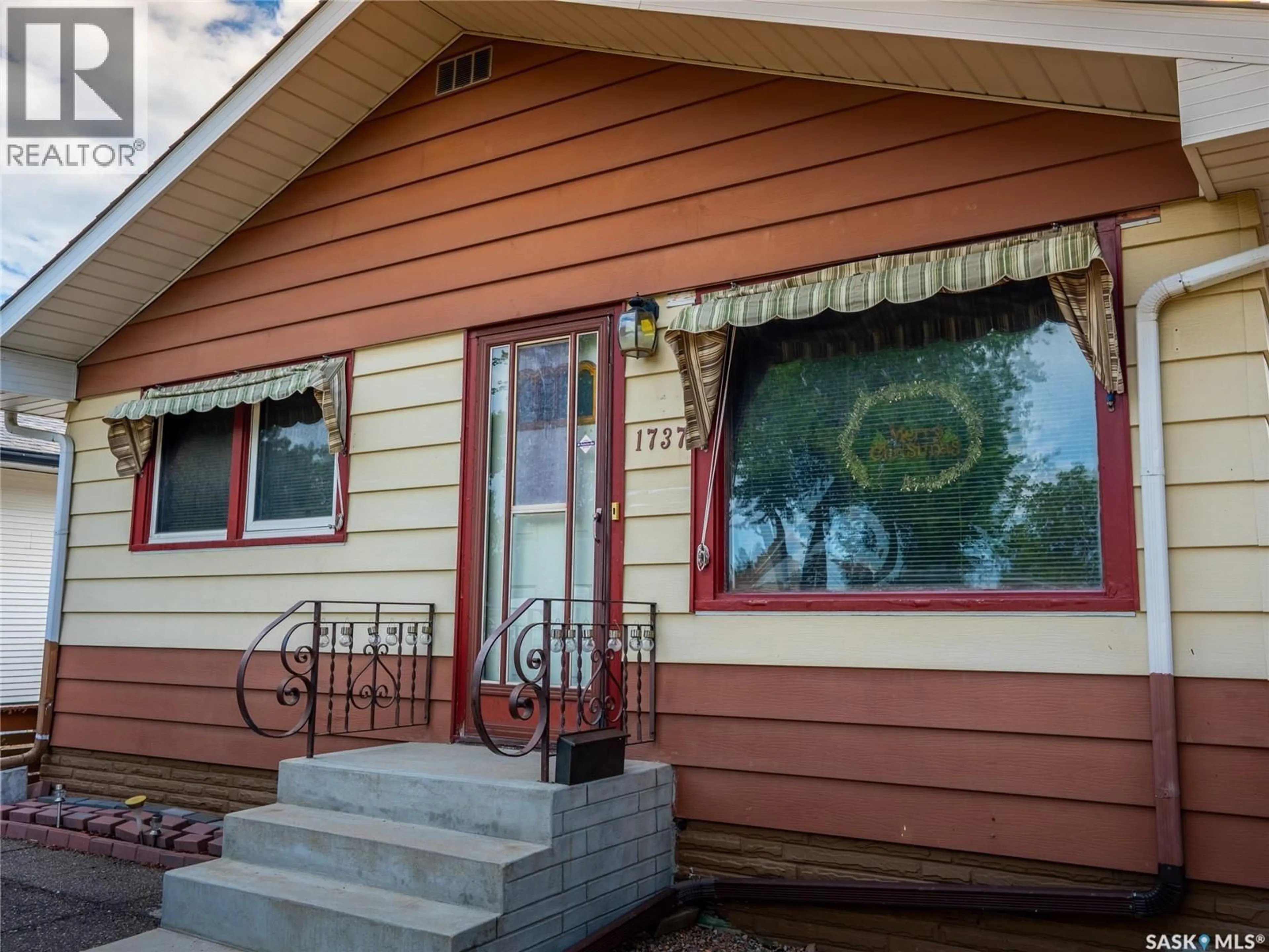 Home with vinyl exterior material, street for 1737 REGENT STREET, Regina Saskatchewan S4N1S4
