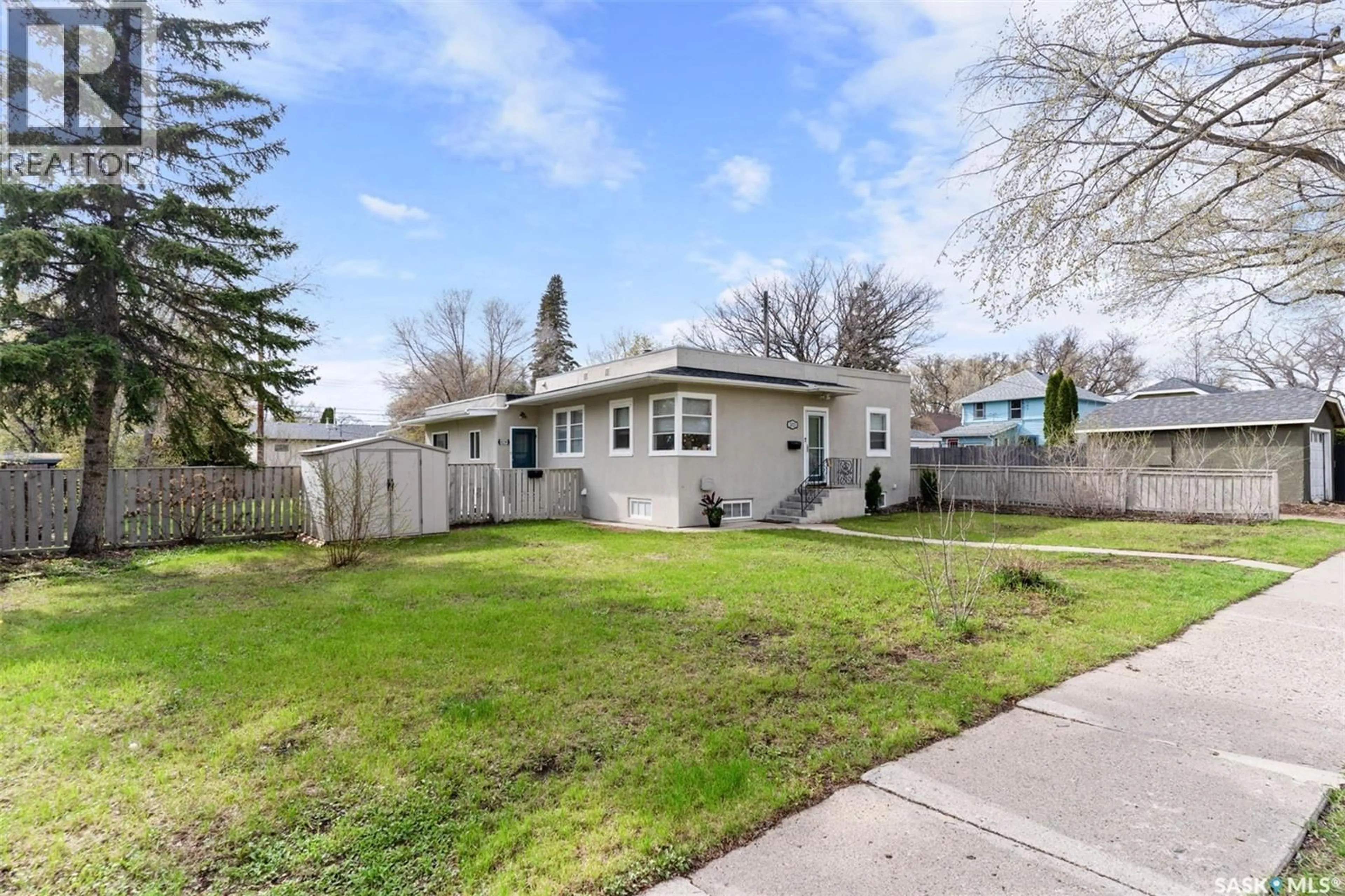 Home with vinyl exterior material, street for 1023 G AVENUE, Saskatoon Saskatchewan S7L2A1