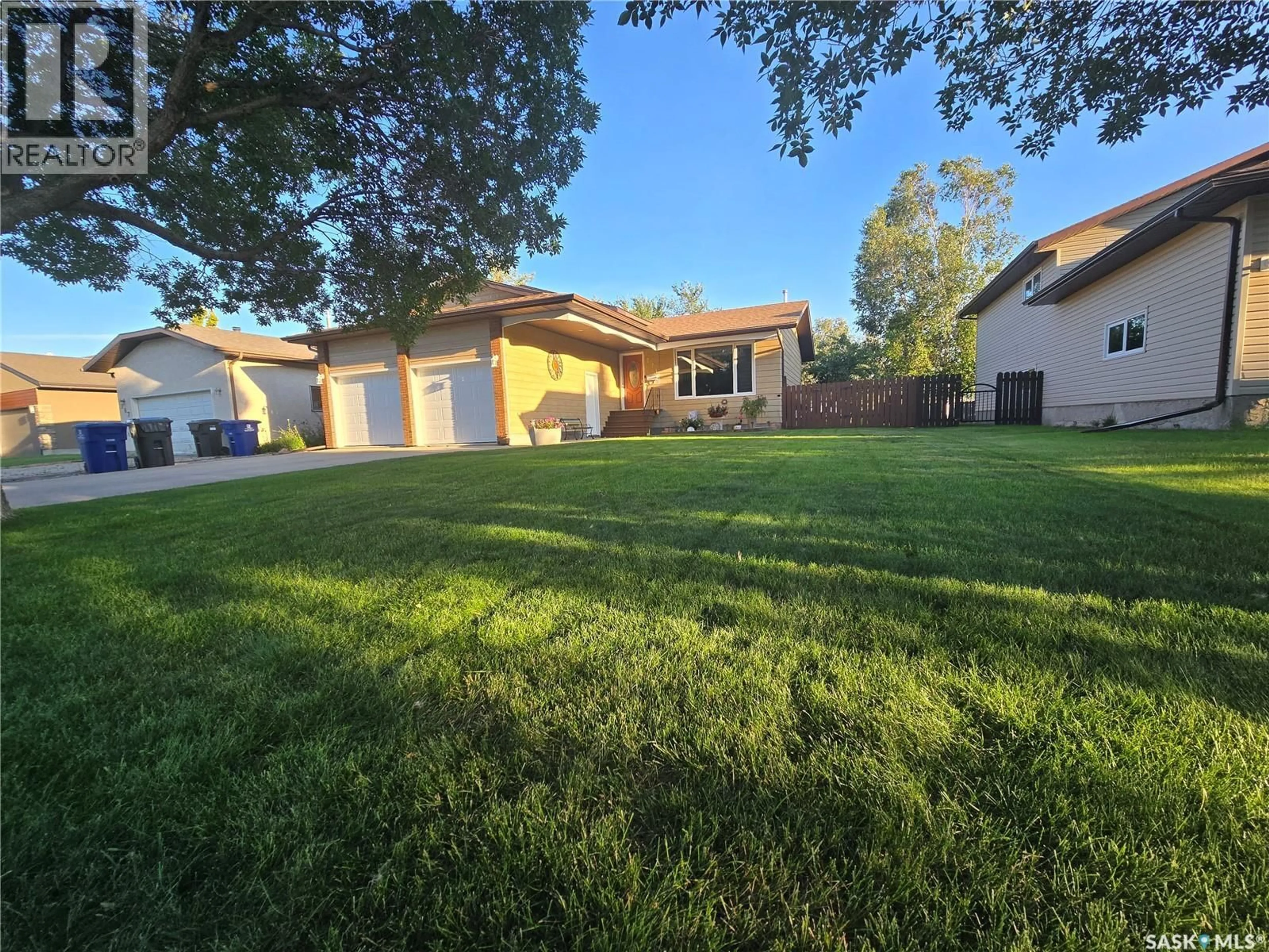 A pic from outside/outdoor area/front of a property/back of a property/a pic from drone, street for 771 BRIMACOMBE DRIVE, Weyburn Saskatchewan S4H2P7