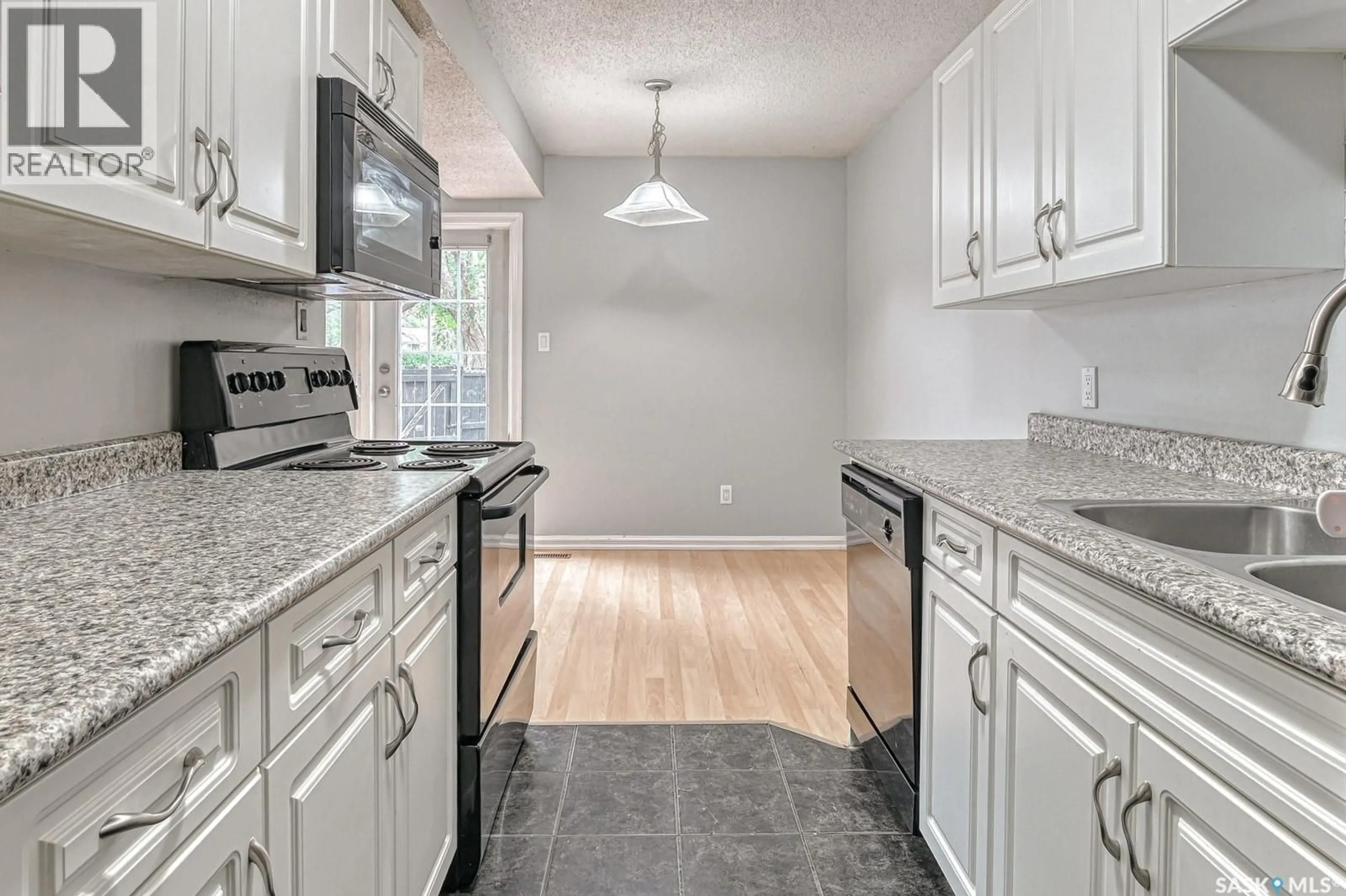 Open concept kitchen, ceramic/tile floor for 4220 CASTLE ROAD, Regina Saskatchewan S4S4W1