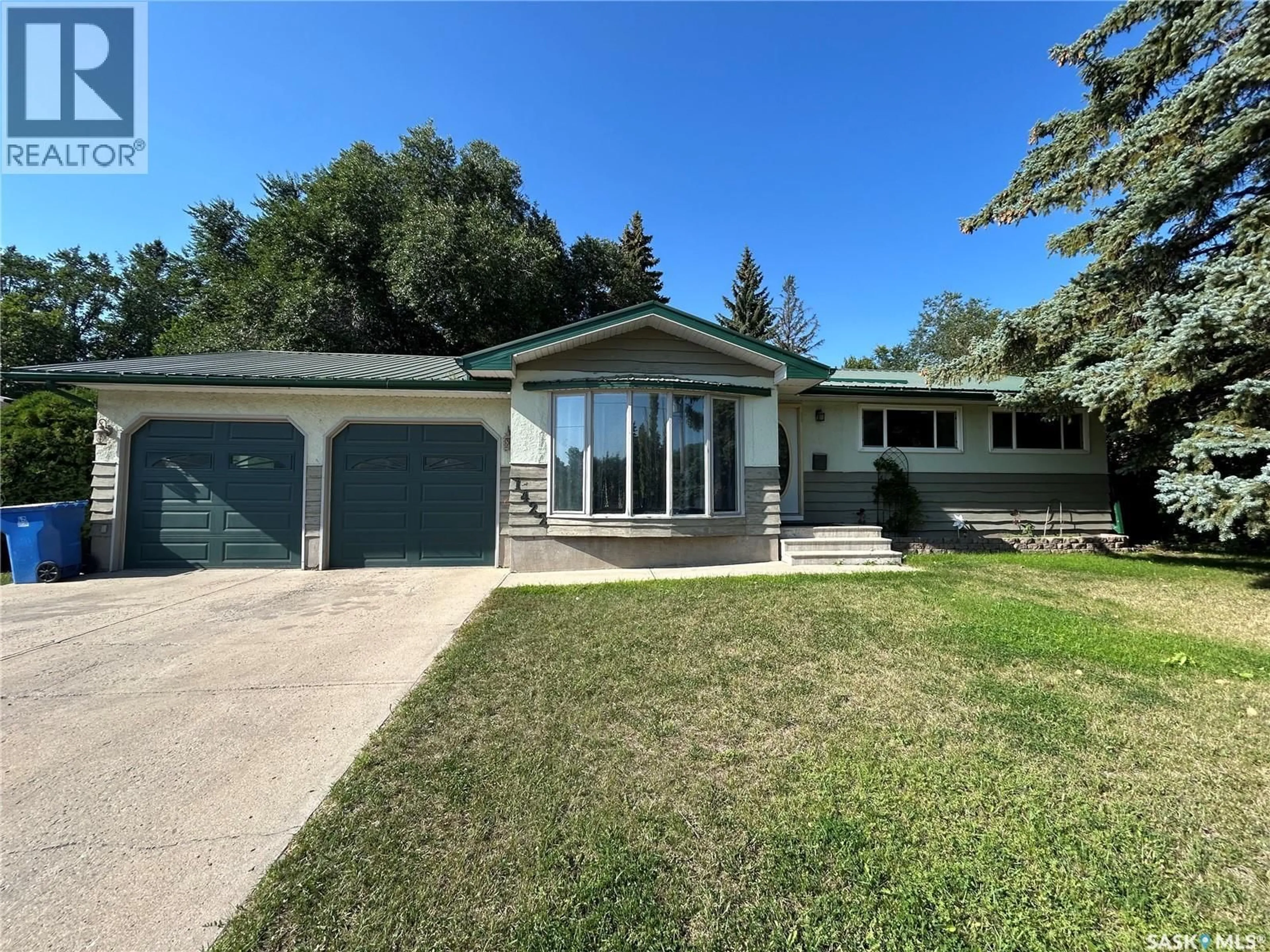 Home with vinyl exterior material, street for 1422 NICHOLSON ROAD, Estevan Saskatchewan S4A1T8
