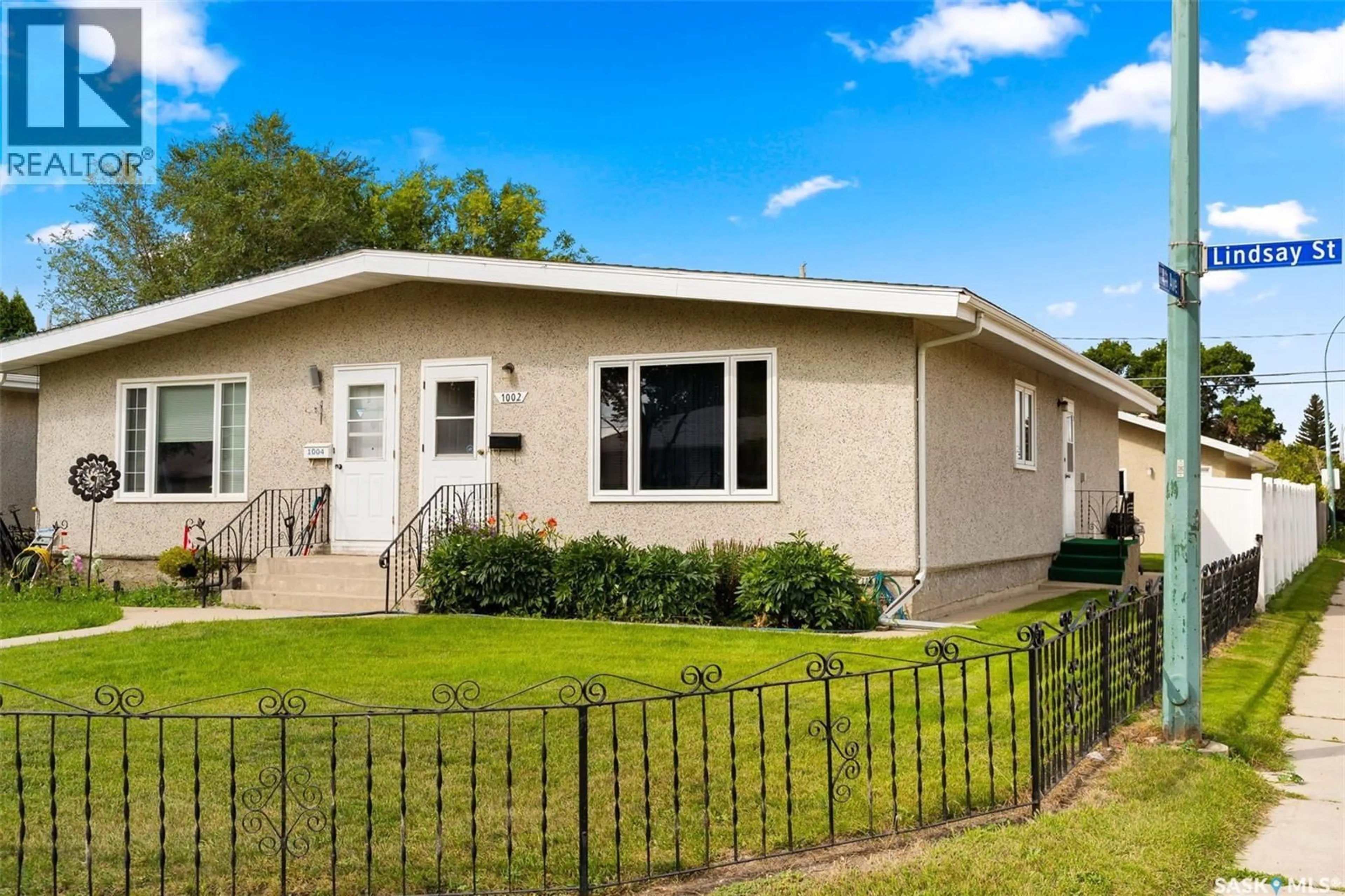 Home with vinyl exterior material, street for 1002 LINDSAY STREET, Regina Saskatchewan S4N3A9