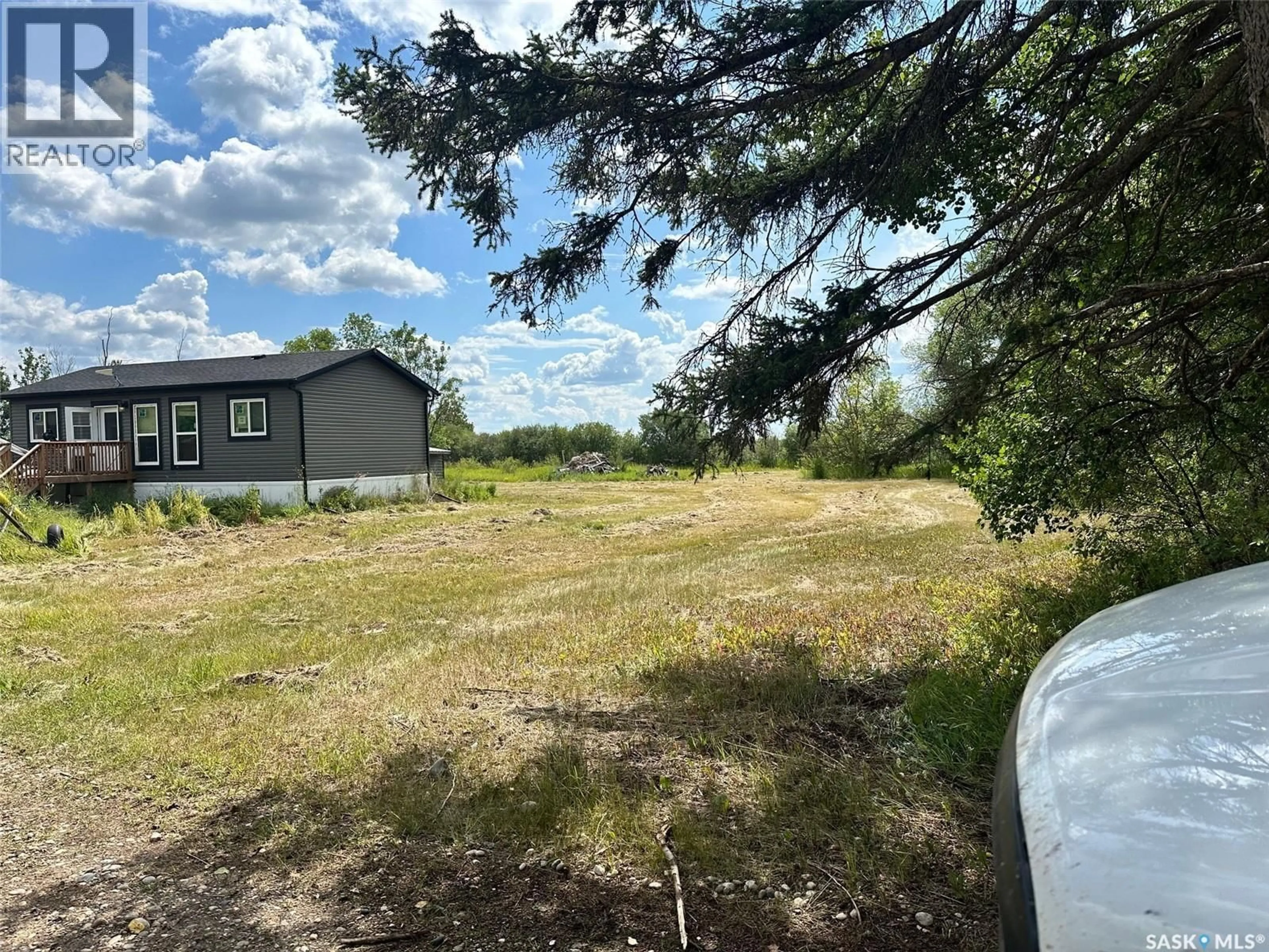 A pic from outside/outdoor area/front of a property/back of a property/a pic from drone, unknown for MARSHALL ACREAGE, Hudson Bay Saskatchewan S0E0Y0