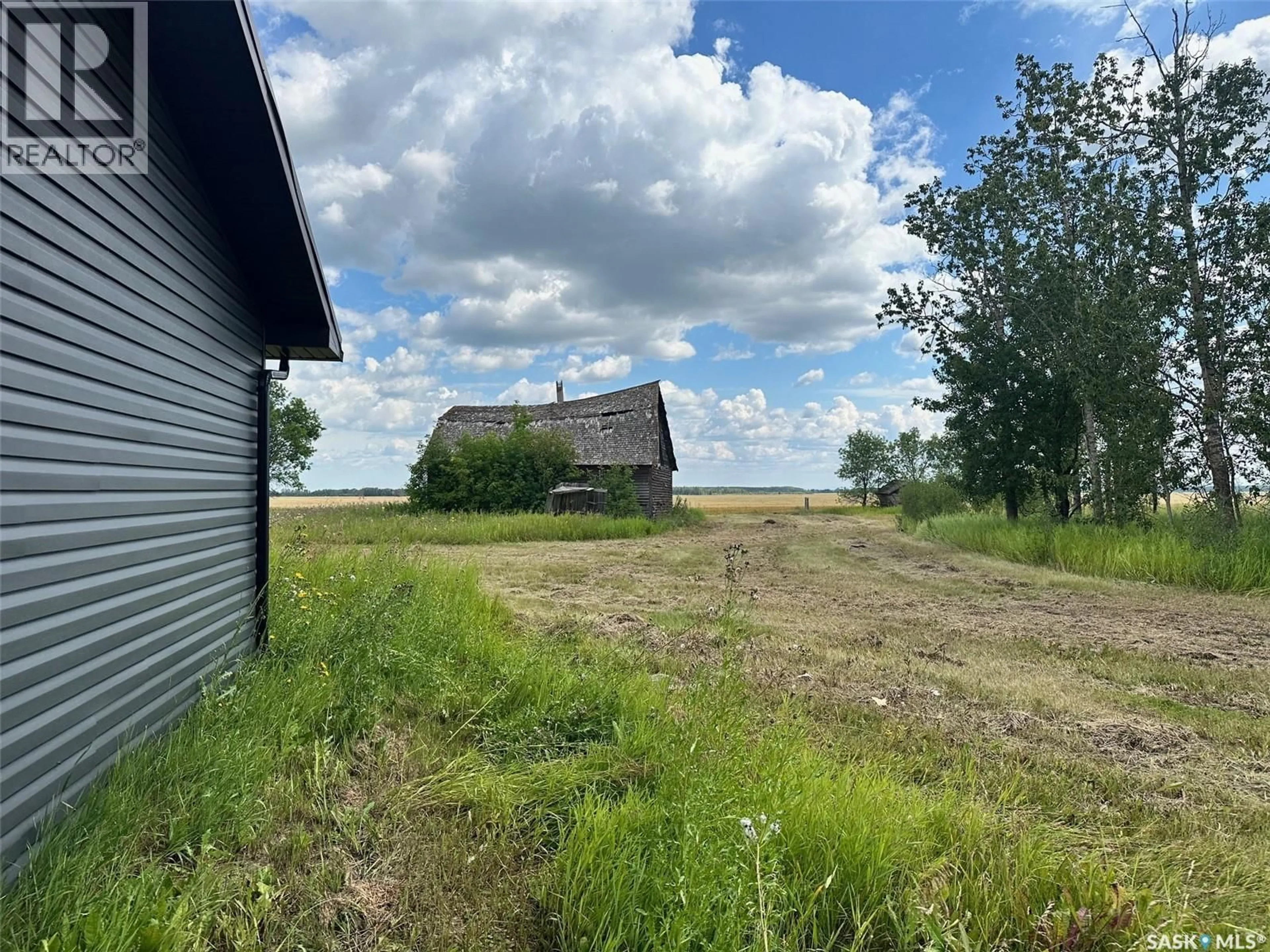 A pic from outside/outdoor area/front of a property/back of a property/a pic from drone, unknown for MARSHALL ACREAGE, Hudson Bay Saskatchewan S0E0Y0