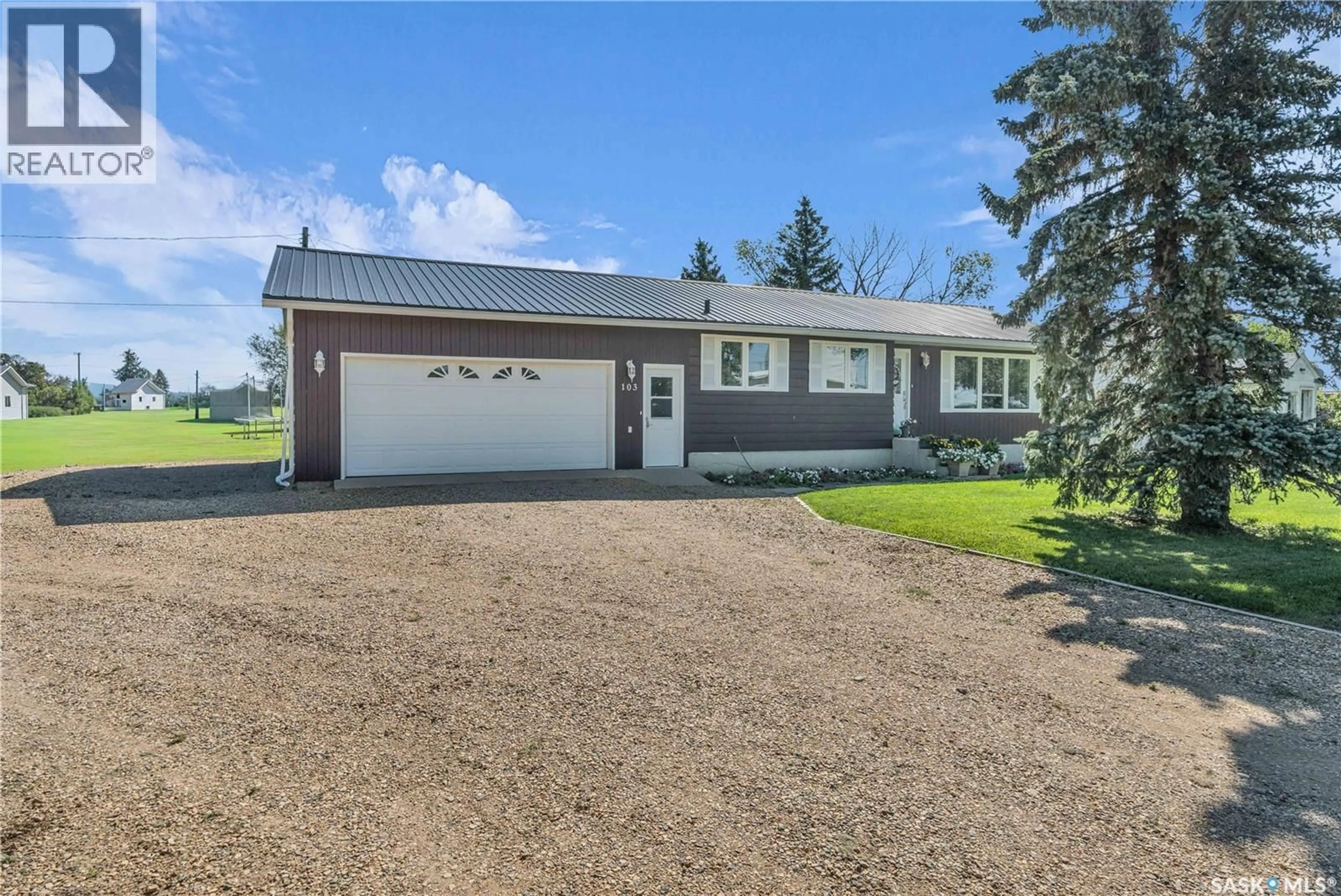 Home with vinyl exterior material, street for 103 1ST STREET, Limerick Saskatchewan S0H2P0