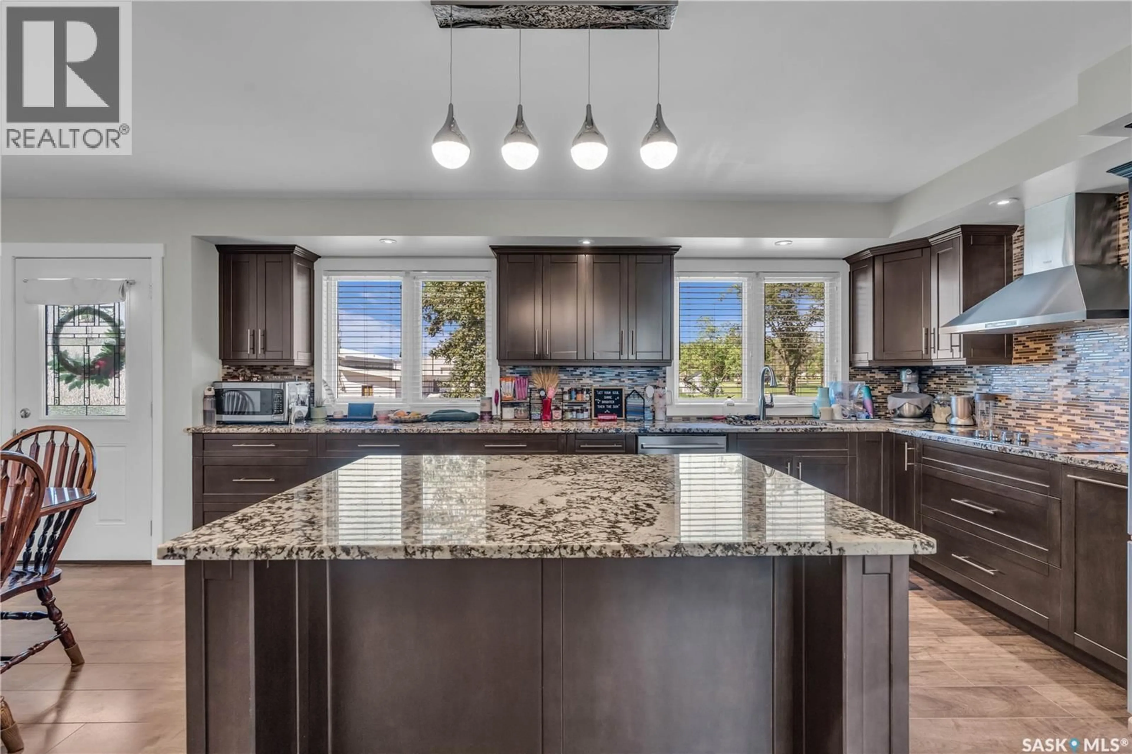 Open concept kitchen, ceramic/tile floor for 103 1ST STREET, Limerick Saskatchewan S0H2P0