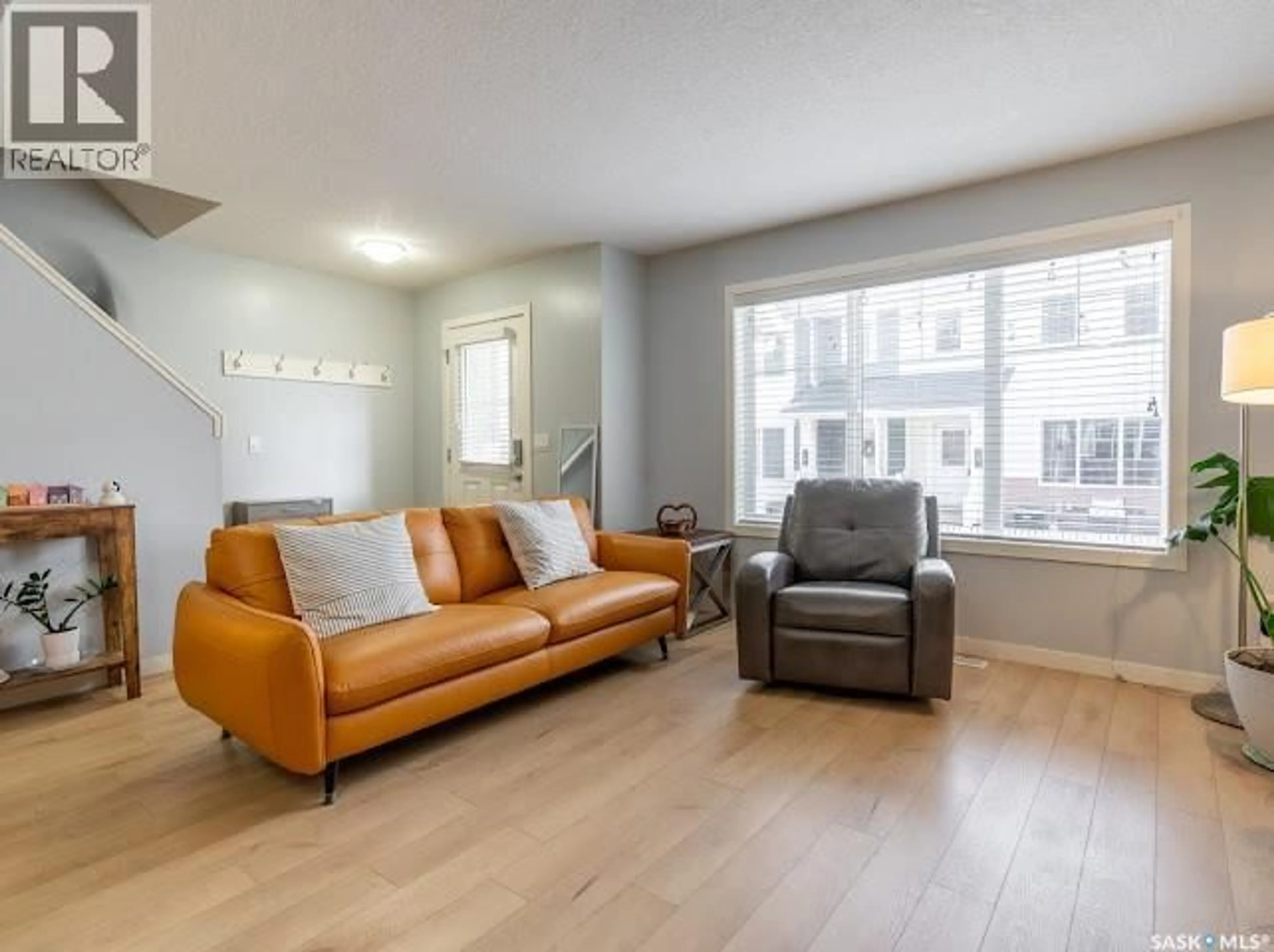 Living room with furniture, unknown for 48 5246 AERODROME ROAD, Regina Saskatchewan S4W0H7