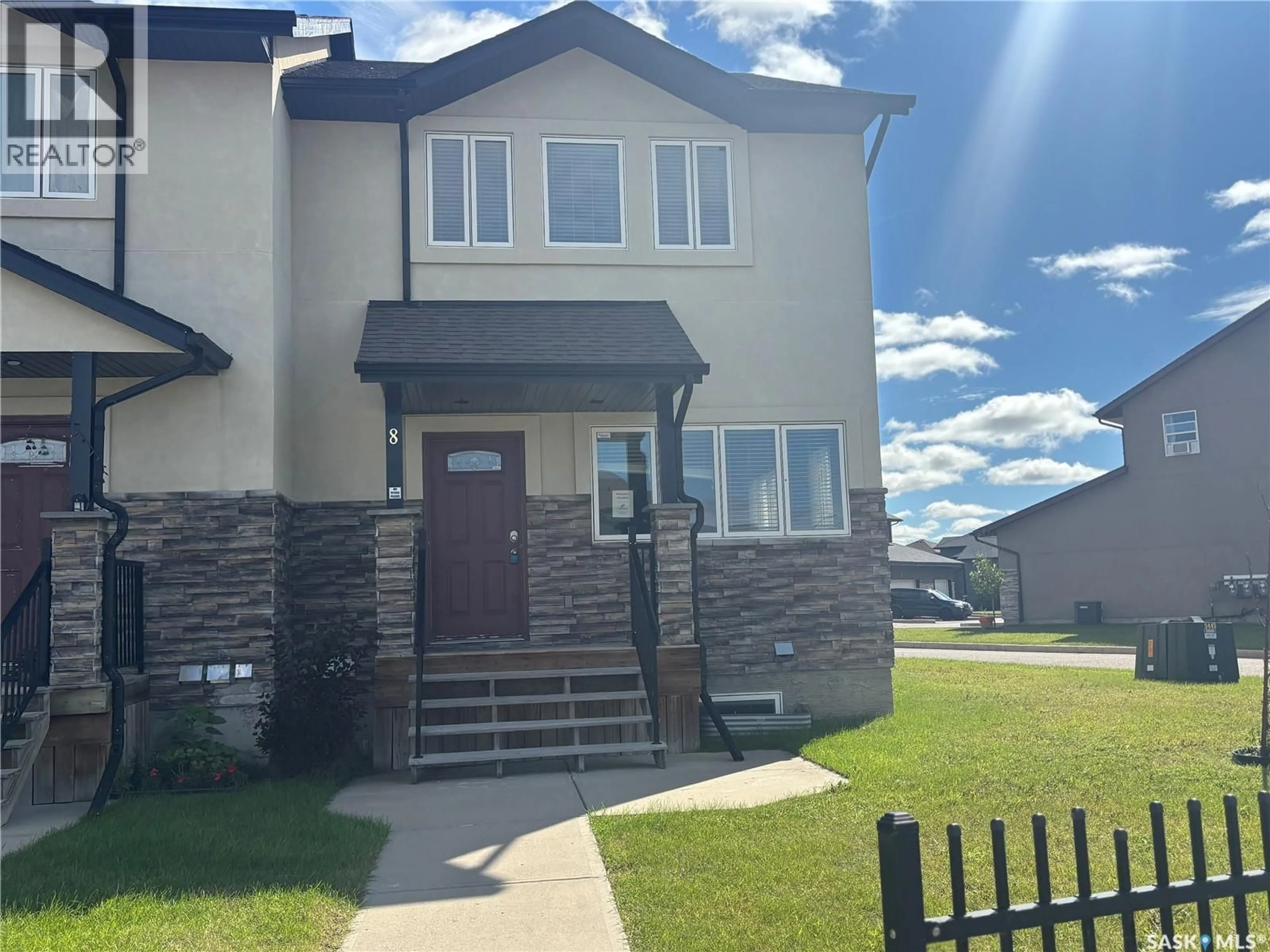 Home with vinyl exterior material, street for 8 - 1703 PATRICK CRESCENT, Saskatoon Saskatchewan S7W0G1