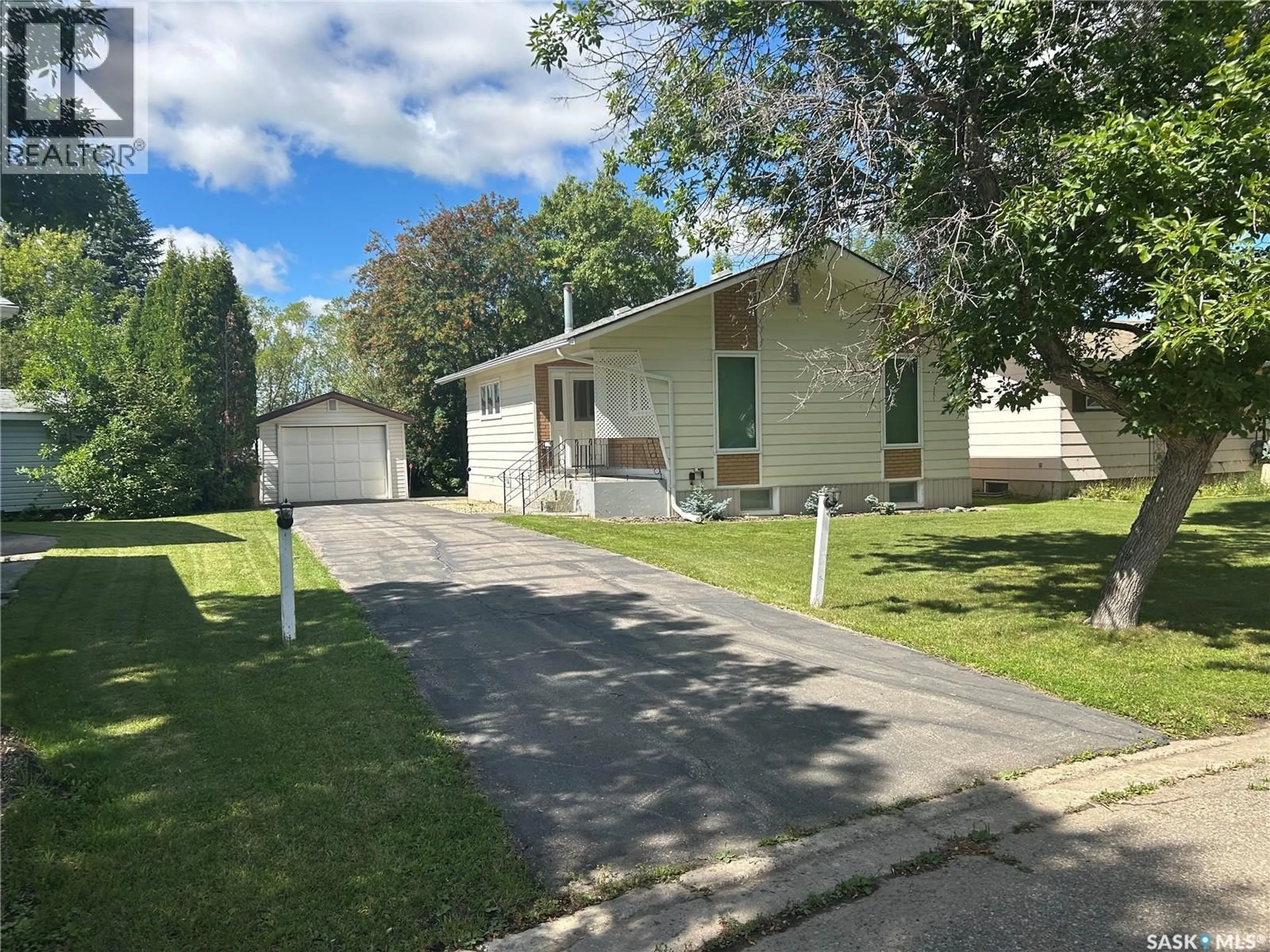 A pic from outside/outdoor area/front of a property/back of a property/a pic from drone, street for 1991 NEWMARKET DRIVE, Tisdale Saskatchewan S0E1T0