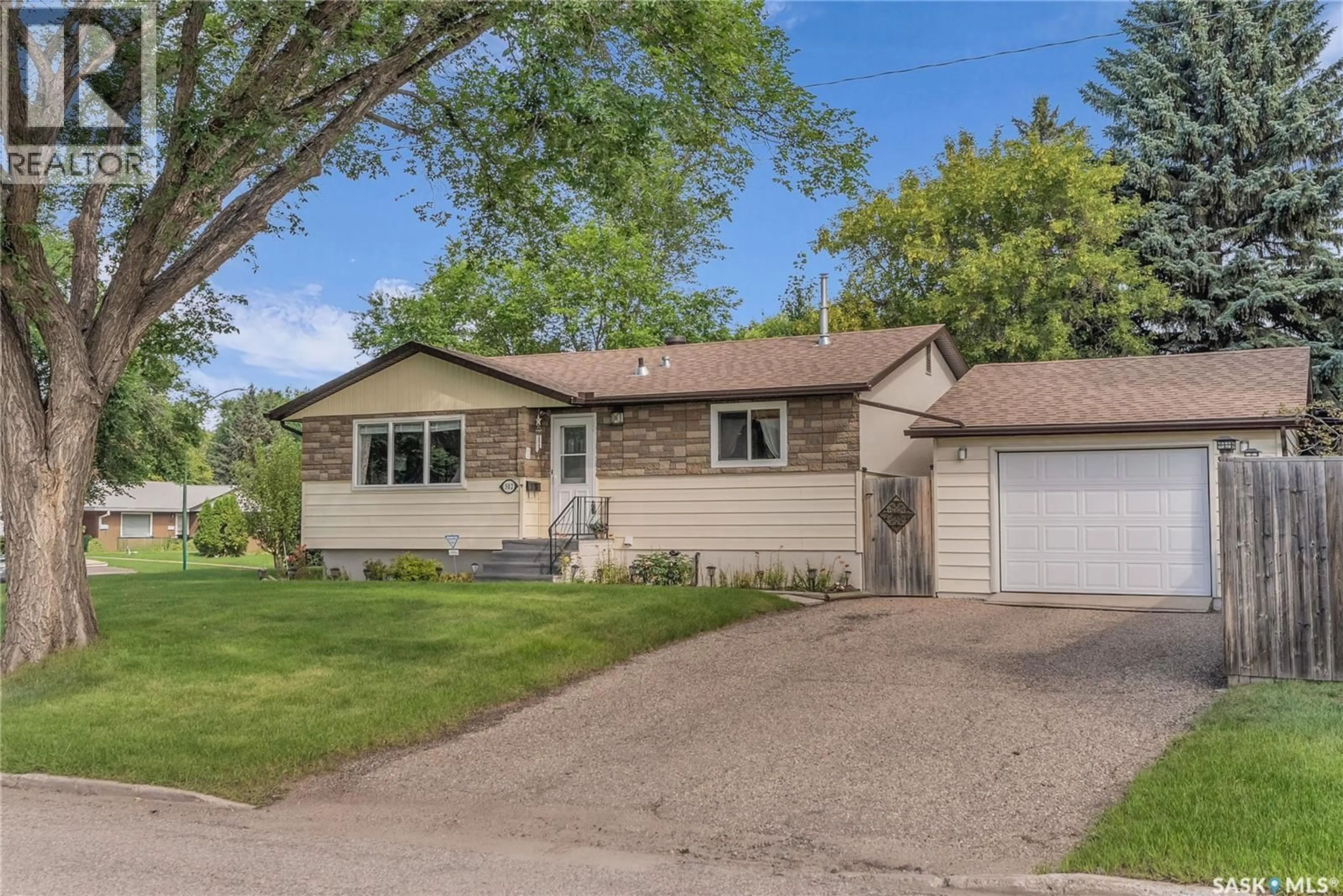 Home with vinyl exterior material, street for 302 OTTAWA AVENUE, Saskatoon Saskatchewan S7L3P1