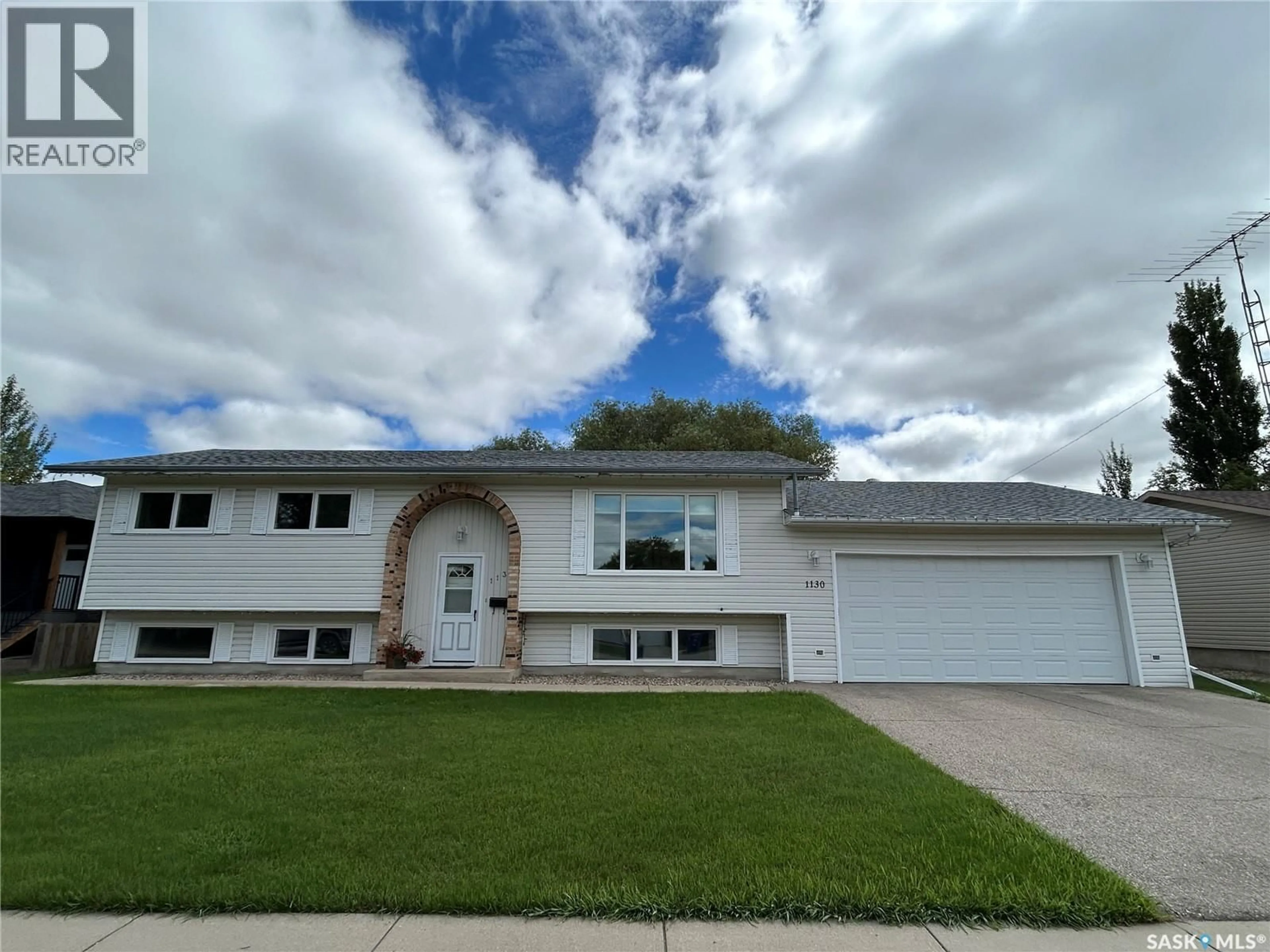 Home with vinyl exterior material, street for 1130 9TH STREET, Humboldt Saskatchewan S0K2A0