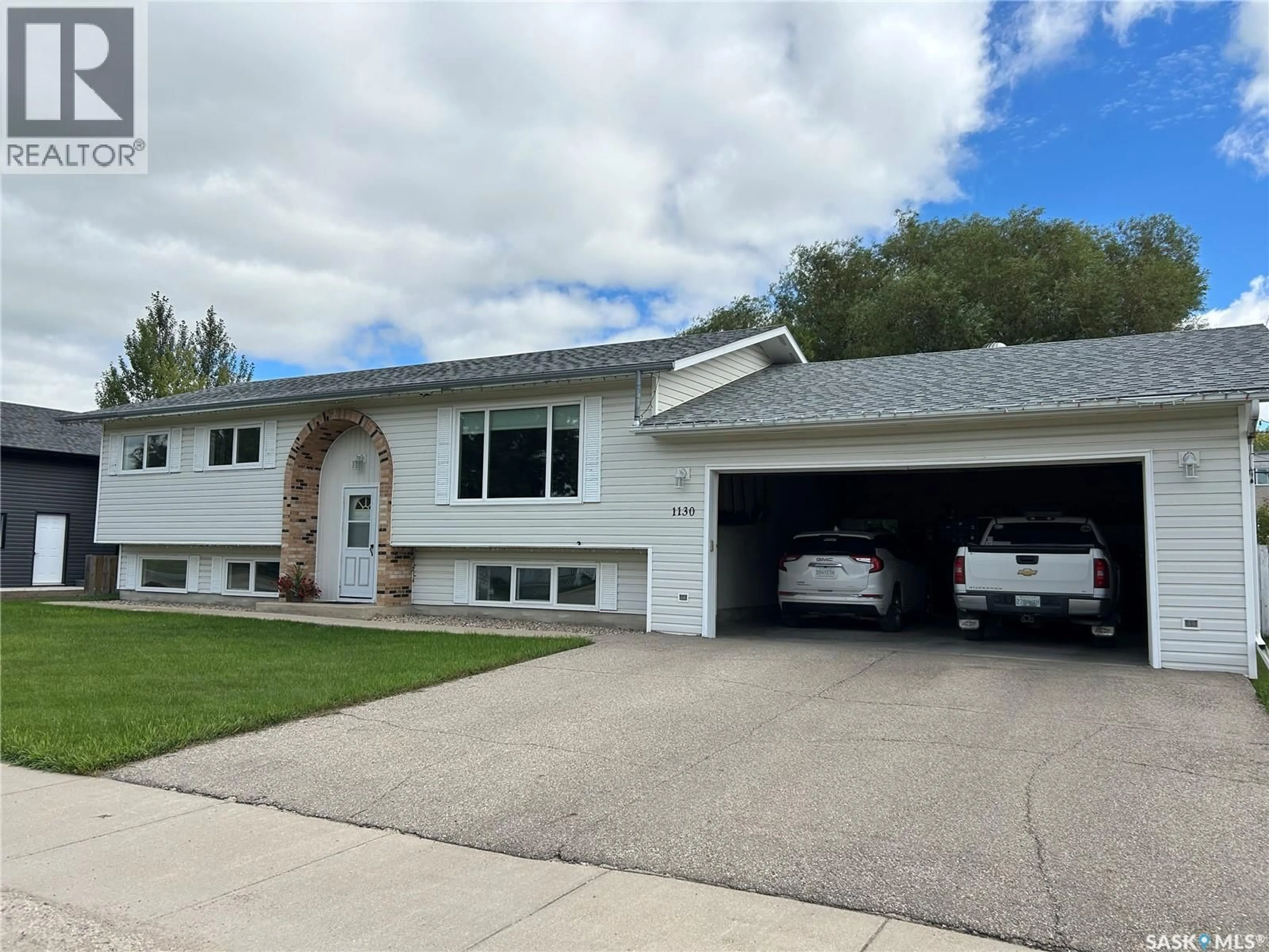 Home with vinyl exterior material, street for 1130 9TH STREET, Humboldt Saskatchewan S0K2A0