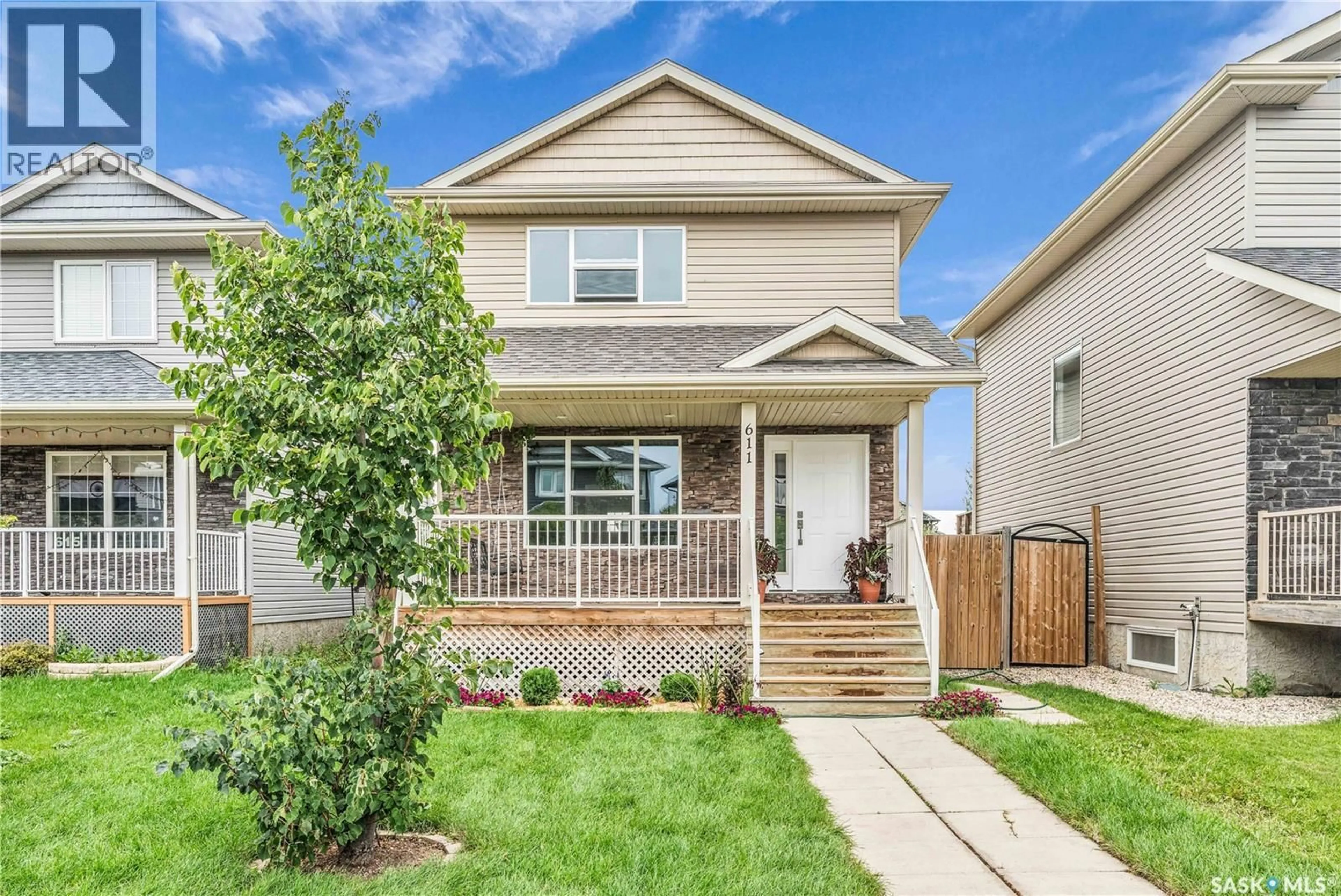 Home with brick exterior material, street for 611 PADGET LANE, Saskatoon Saskatchewan S7W0H3