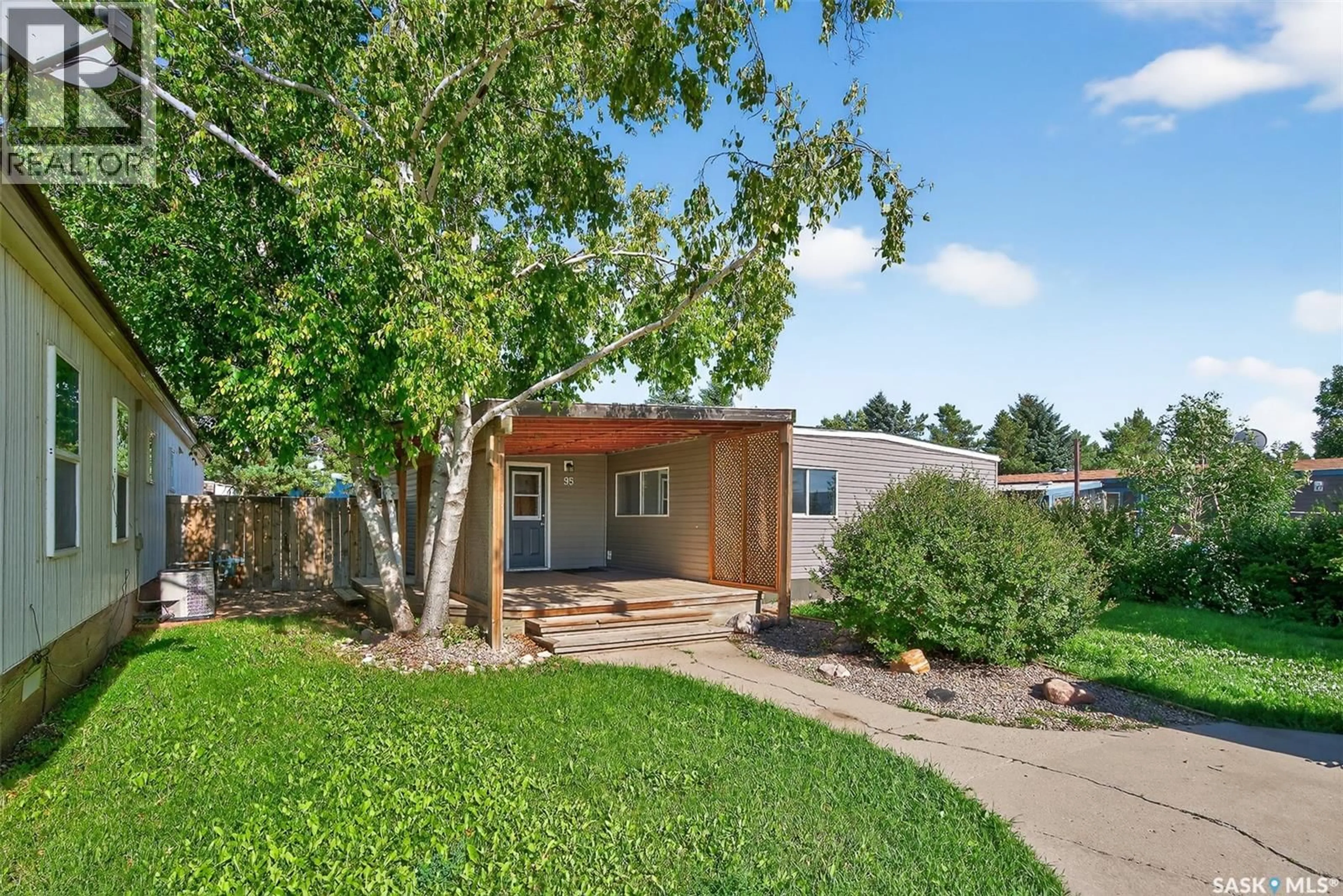 A pic from outside/outdoor area/front of a property/back of a property/a pic from drone, street for 95 LARCH STREET, Caronport Saskatchewan S0H0S0