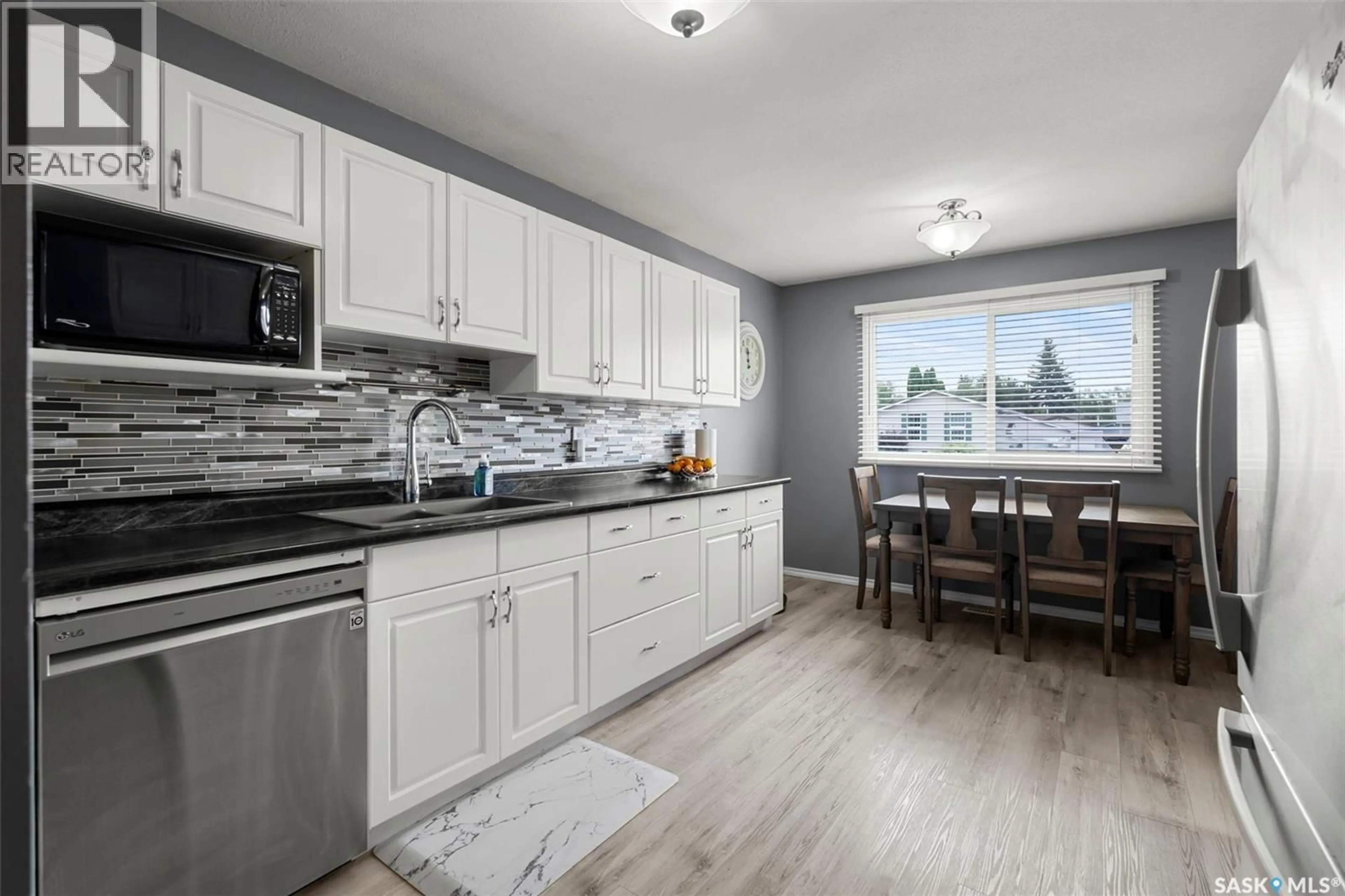Open concept kitchen, ceramic/tile floor for 233 BOYCHUK DRIVE, Saskatoon Saskatchewan S7H4C8