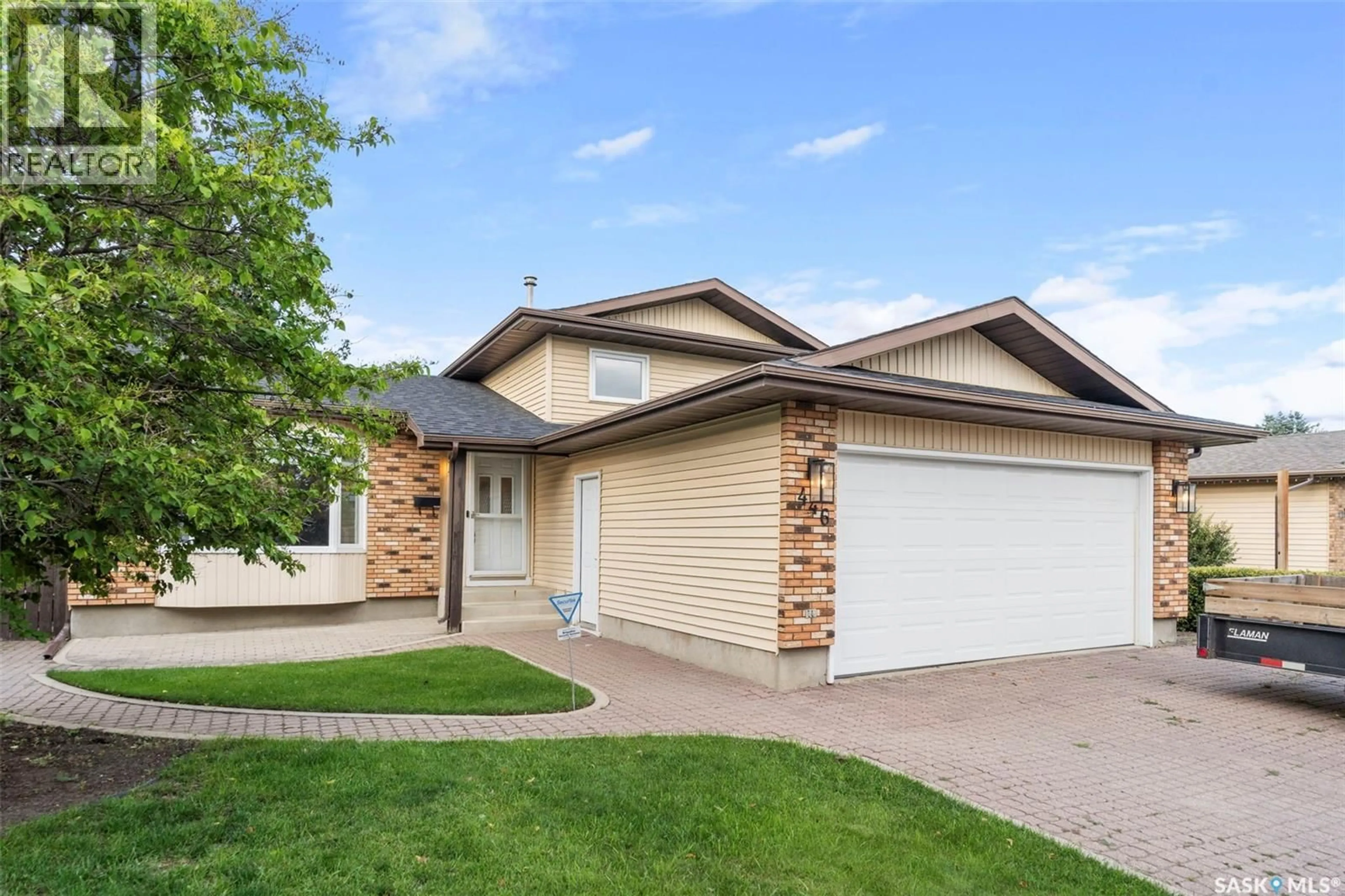 Home with vinyl exterior material, street for 446 PEBERDY CRESCENT, Saskatoon Saskatchewan S7K7N3