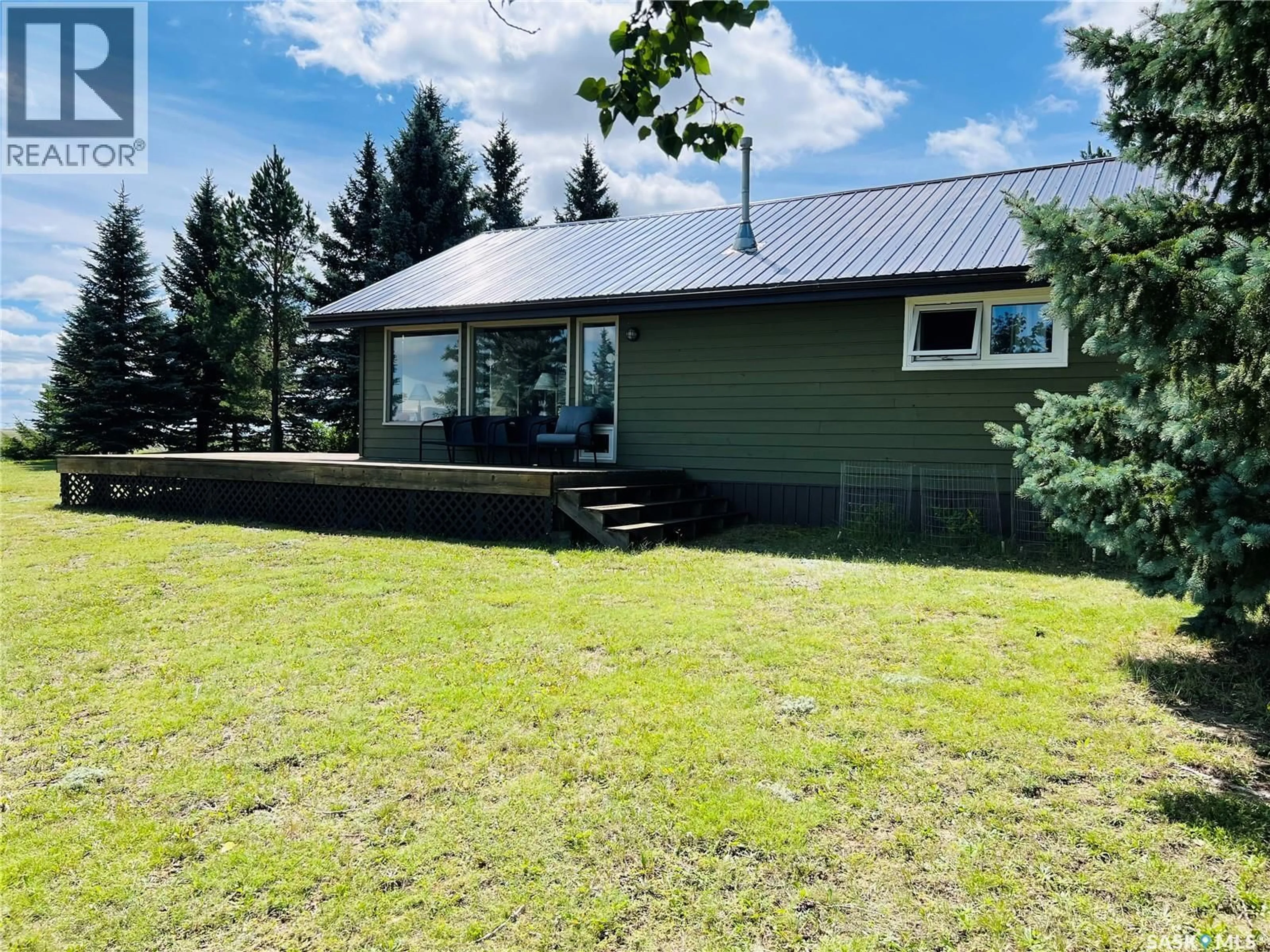 A pic from outside/outdoor area/front of a property/back of a property/a pic from drone, unknown for 65 SARGEANT DRIVE, Diefenbaker Lake Saskatchewan S0H3P0