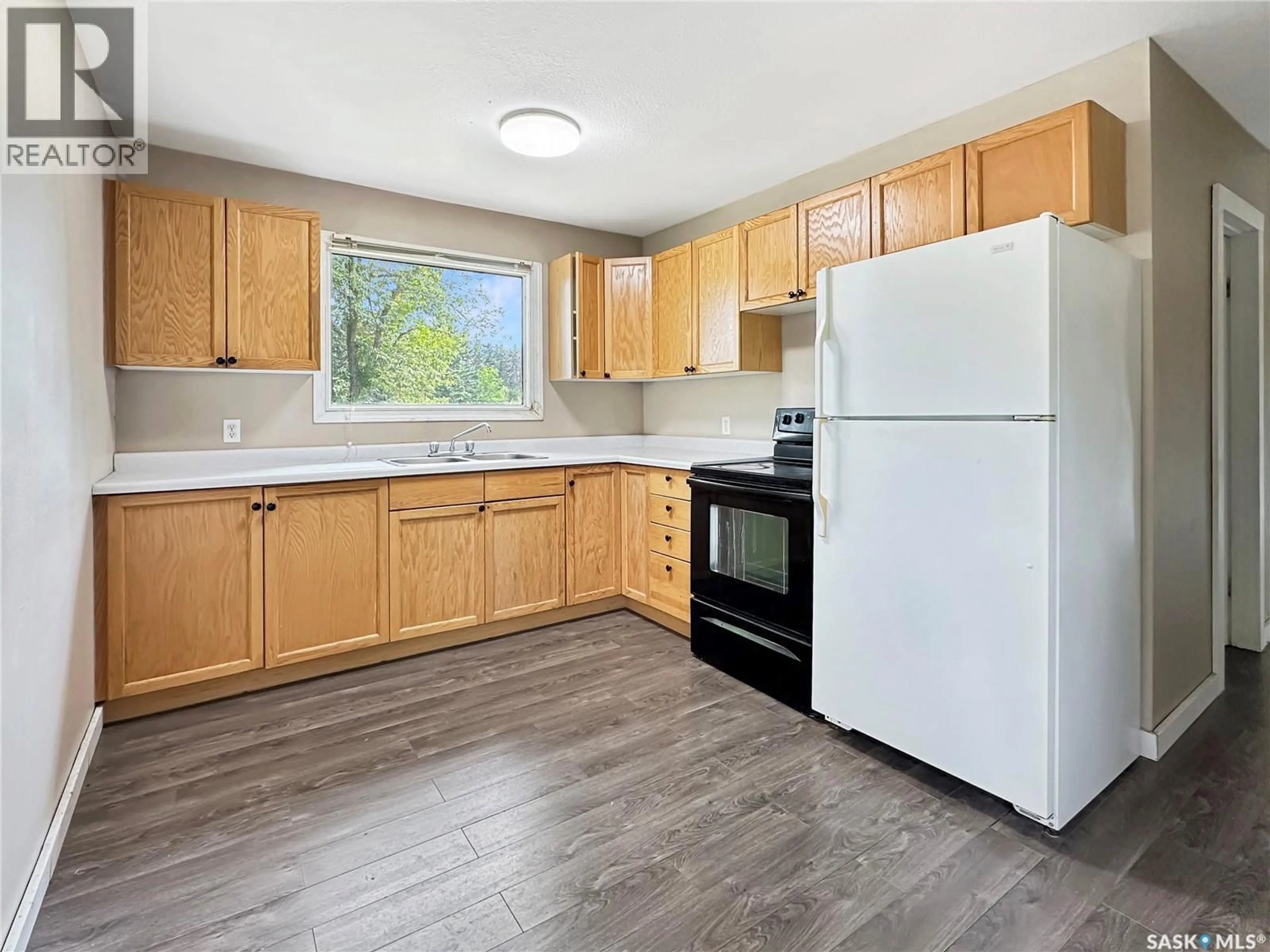 Standard kitchen, wood/laminate floor for 205 EDEN STREET, Indian Head Saskatchewan S0G2K0