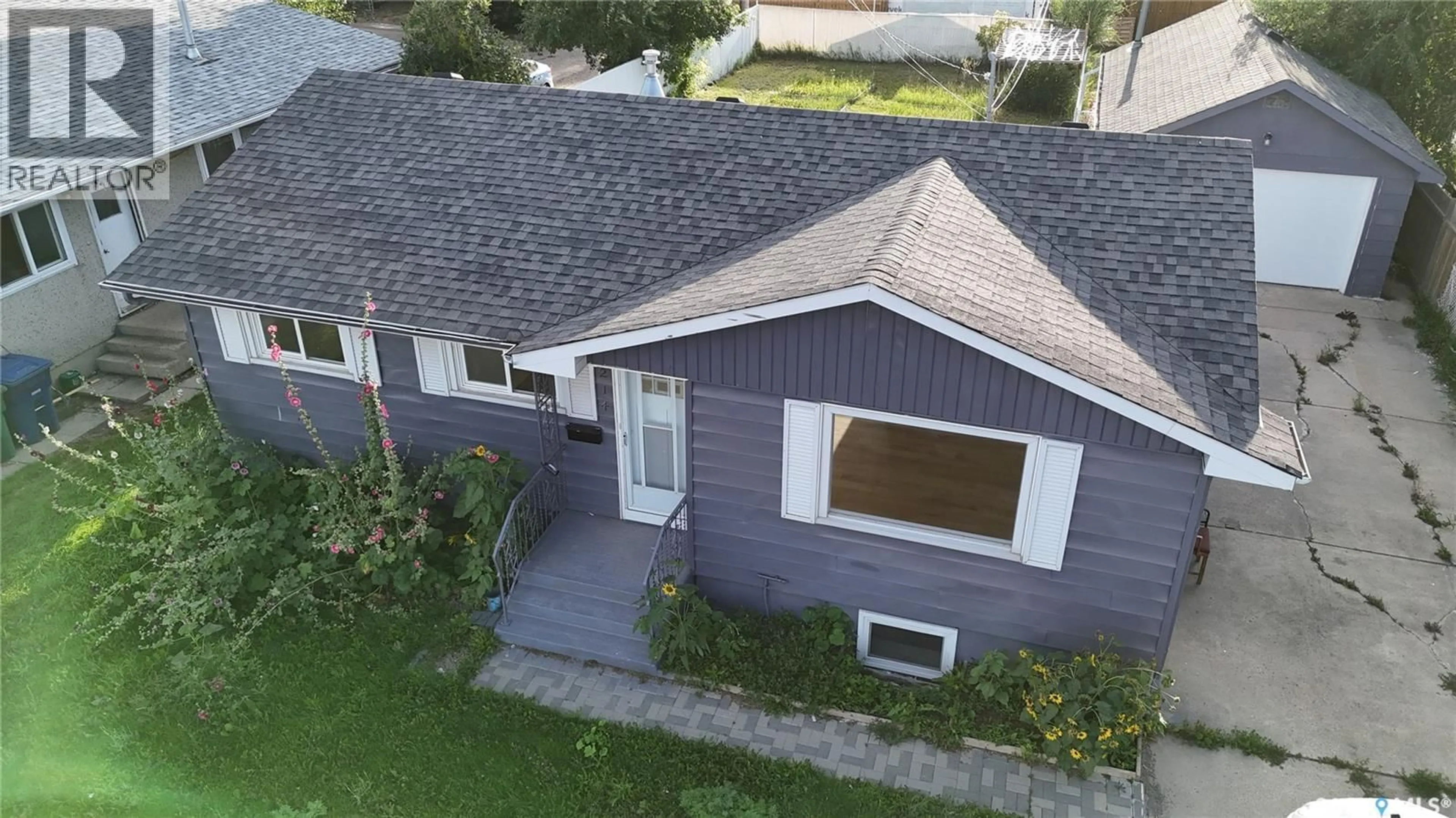 A pic from outside/outdoor area/front of a property/back of a property/a pic from drone, street for 214 CENTRAL AVENUE, Saskatoon Saskatchewan S7N2E7