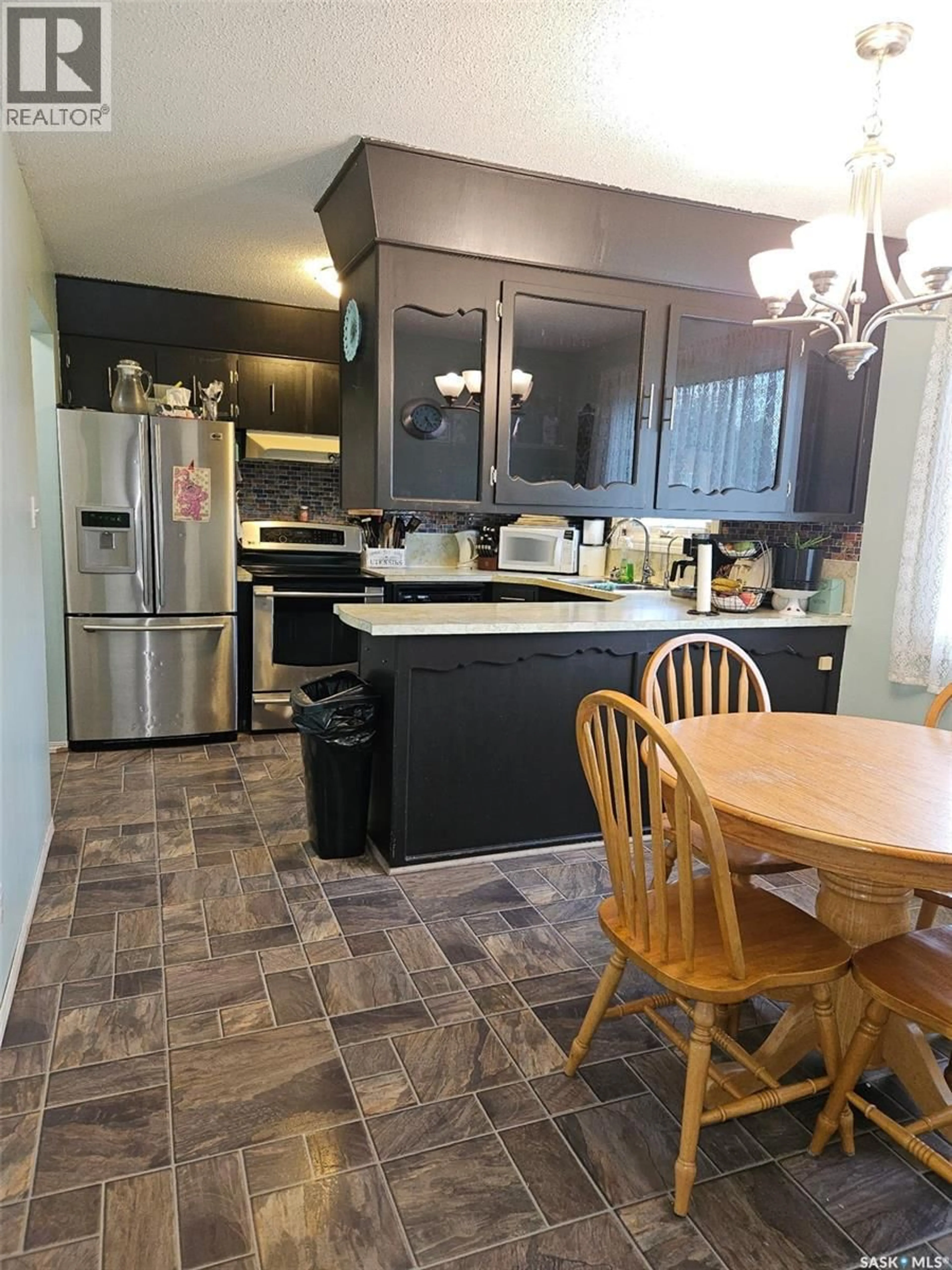 Open concept kitchen, unknown for 21 VANIER DRIVE, Melville Saskatchewan S0A2P0