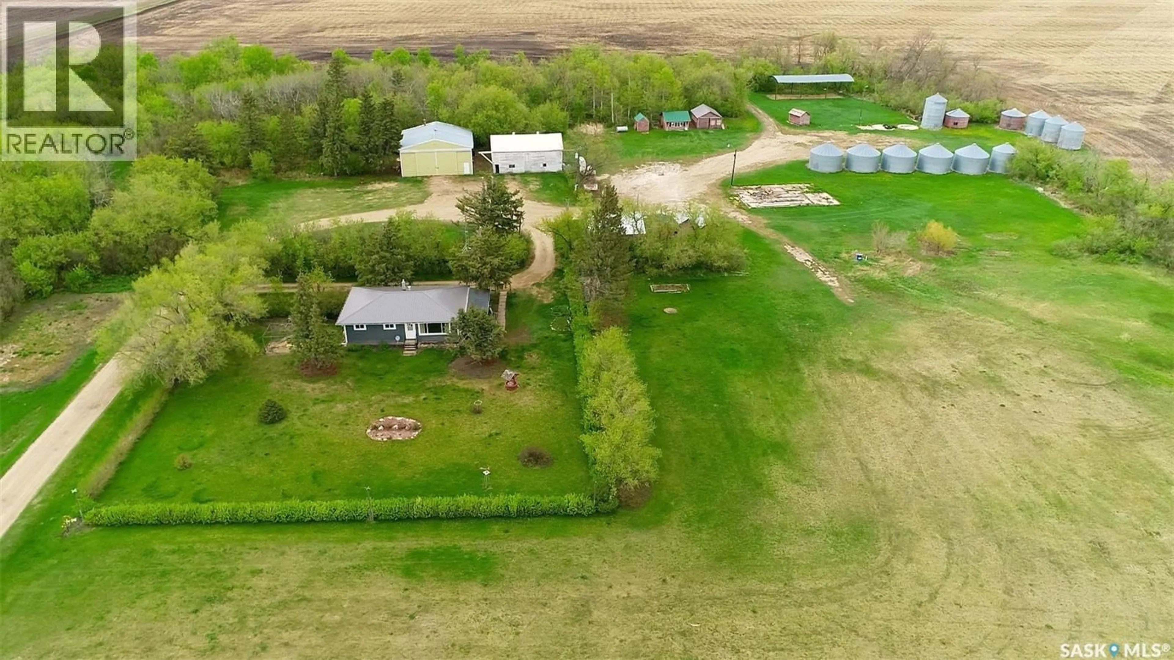 A pic from outside/outdoor area/front of a property/back of a property/a pic from drone, building for 19.32 BROOKSBY ACREAGE, Willow Creek Rm No. 458 Saskatchewan S0E0H0