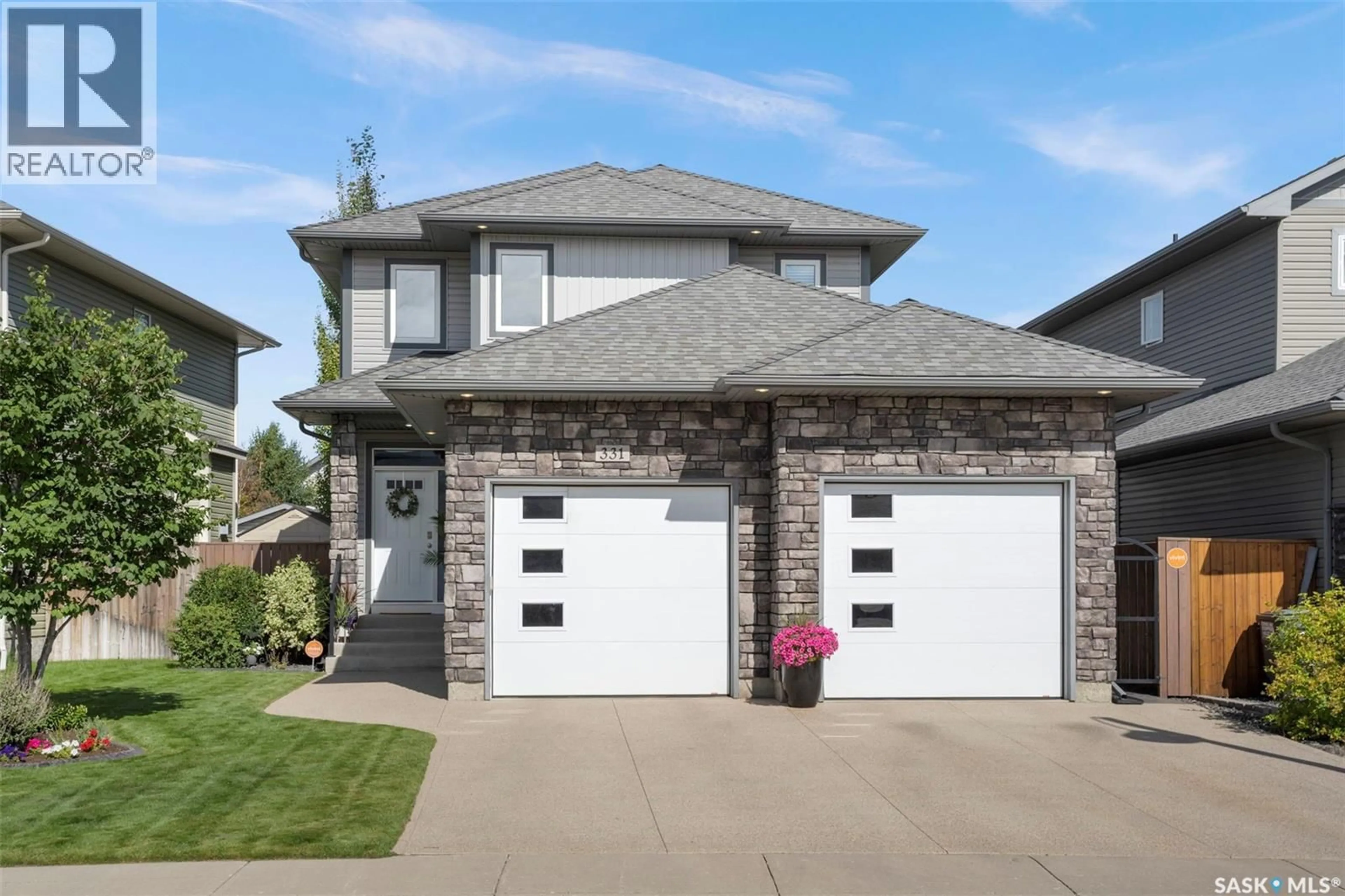 Home with brick exterior material, street for 331 LANGLOIS WAY, Saskatoon Saskatchewan S7T0M9