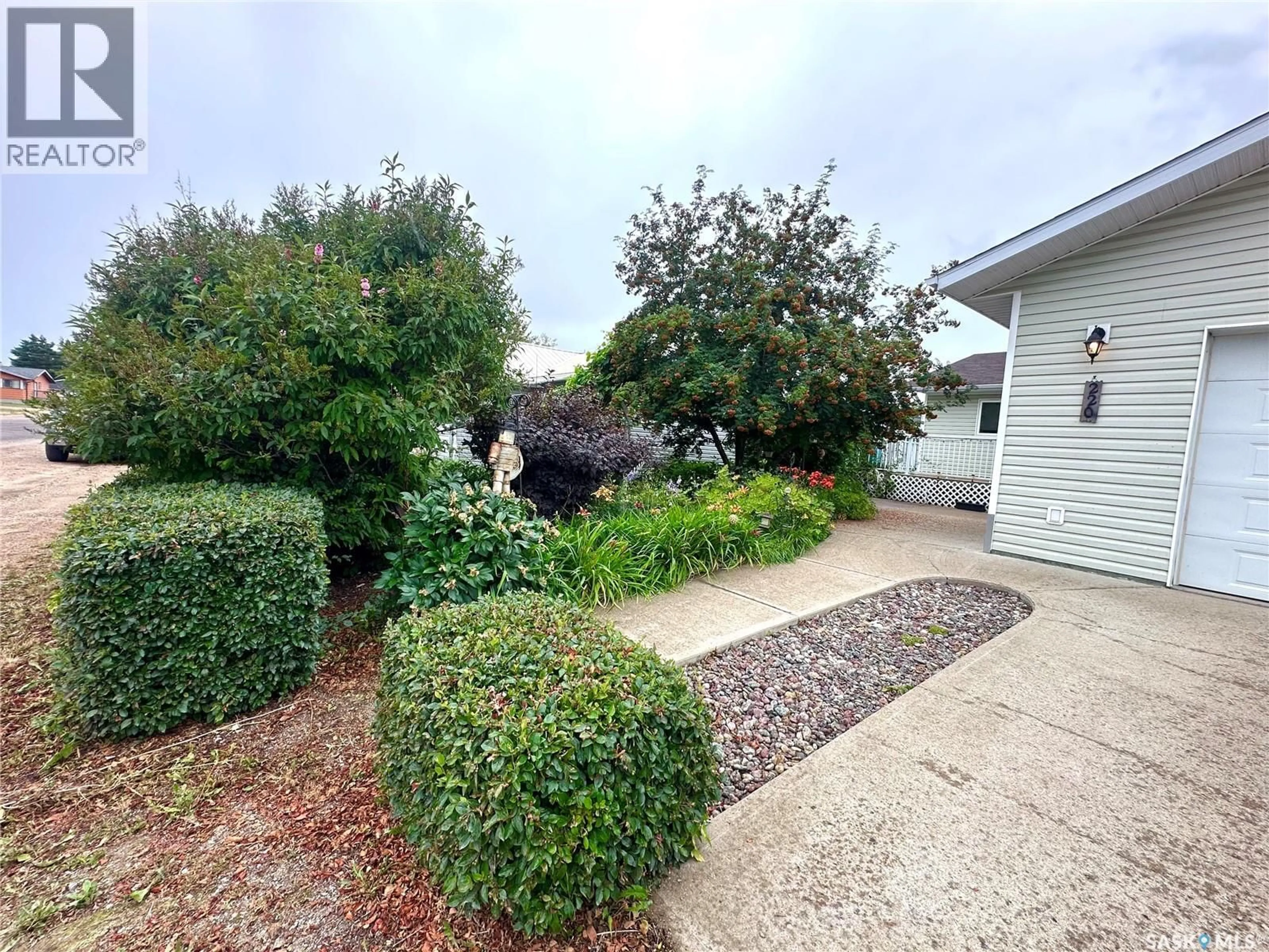 A pic from outside/outdoor area/front of a property/back of a property/a pic from drone, street for 220 3RD STREET, Spiritwood Saskatchewan S0J2M0