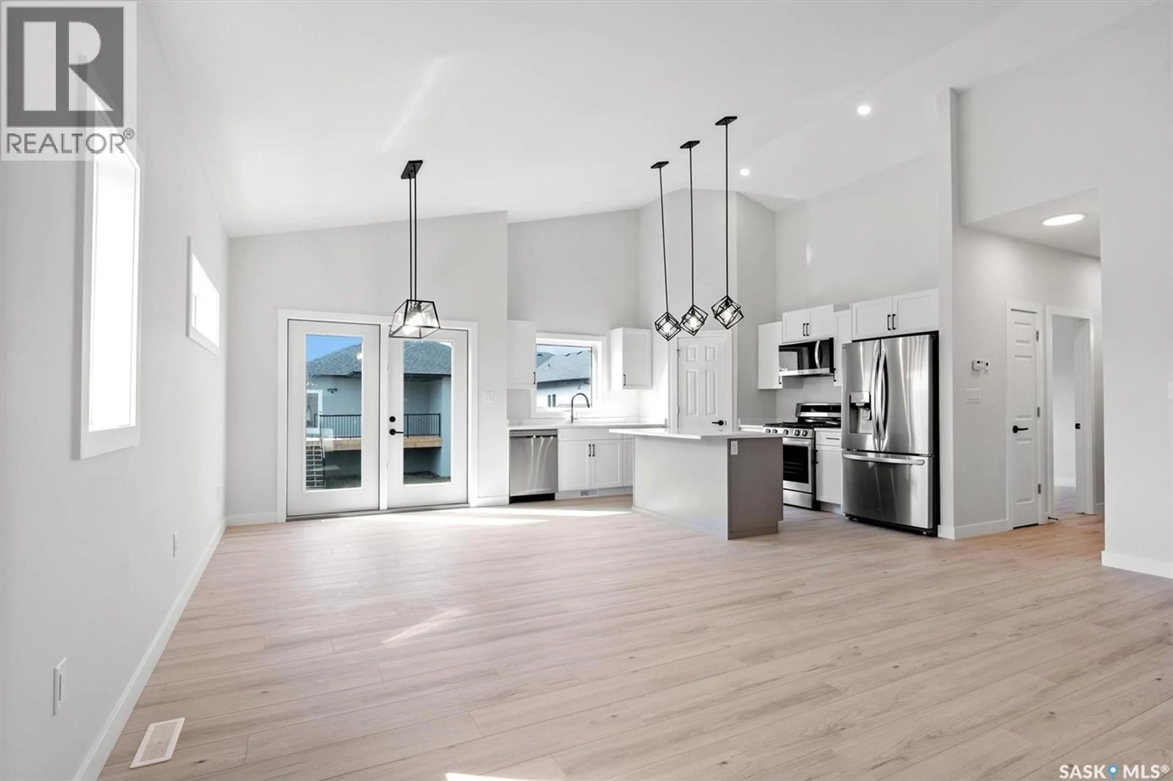Open concept kitchen, unknown for 206 FLYNN BEND, Saskatoon Saskatchewan S7V1R9