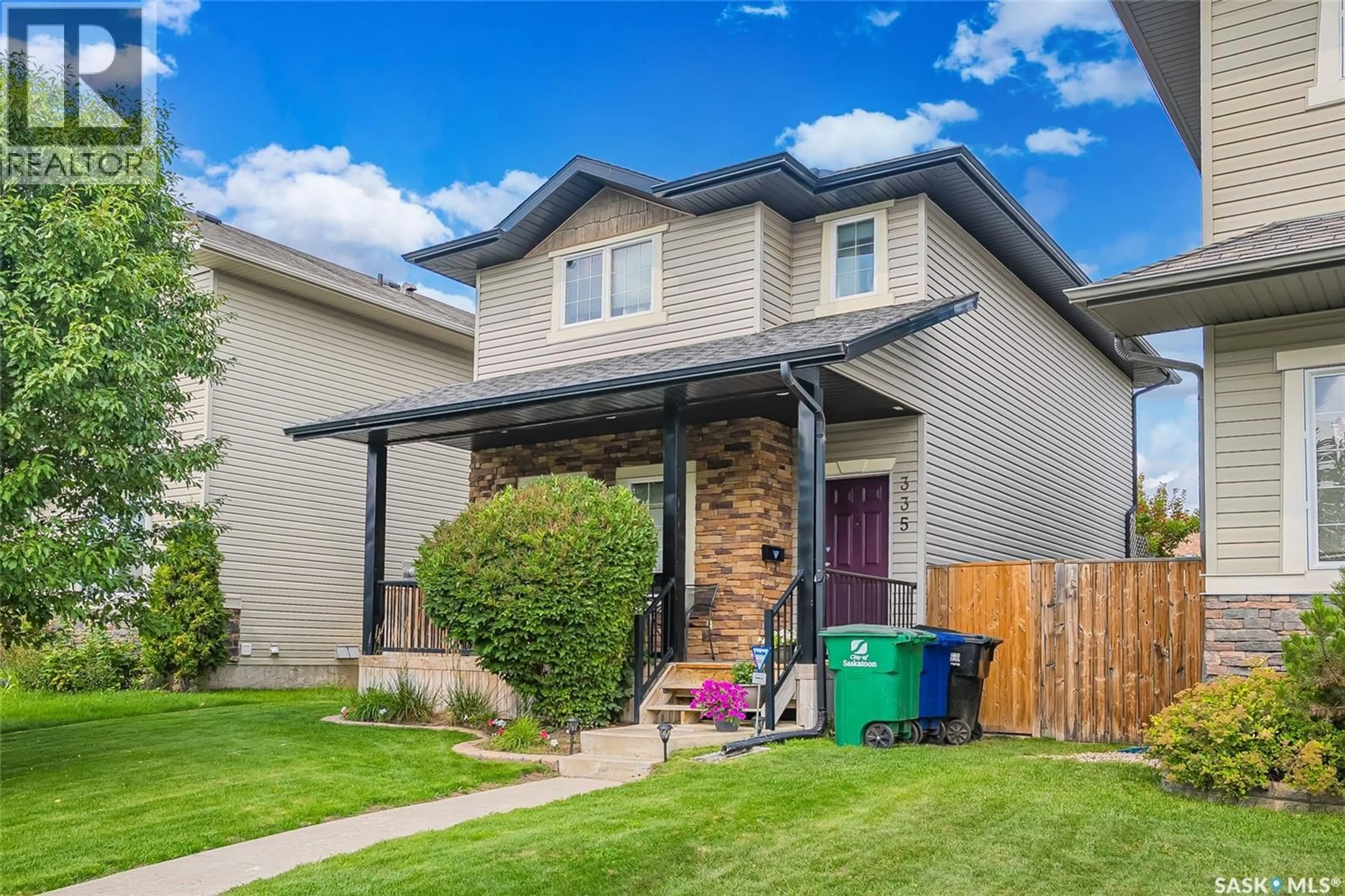 Home with vinyl exterior material, street for 335 LYND LANE, Saskatoon Saskatchewan S7T0B1