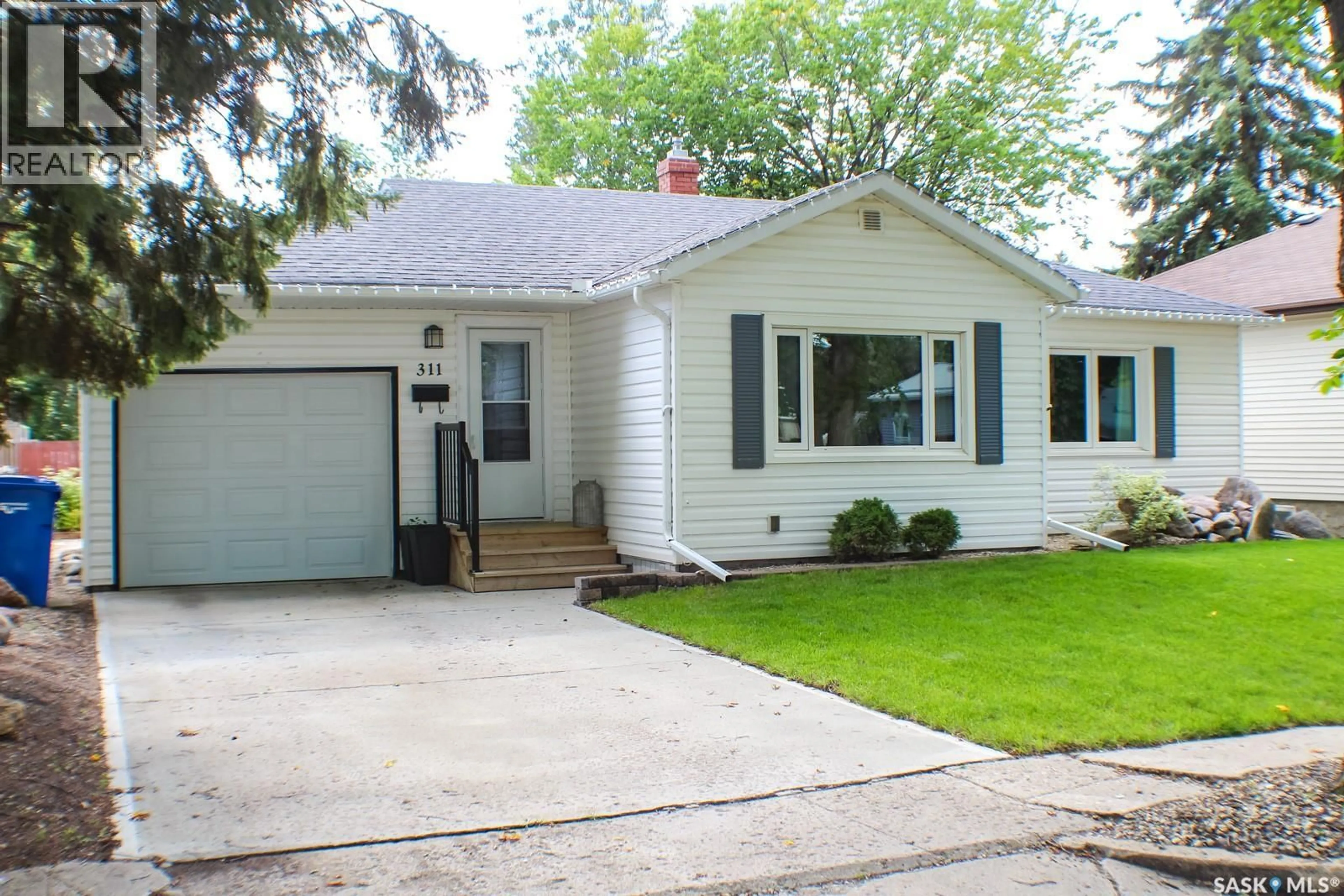Home with vinyl exterior material, street for E - 311 STOVEL AVENUE, Melfort Saskatchewan S0E1A0