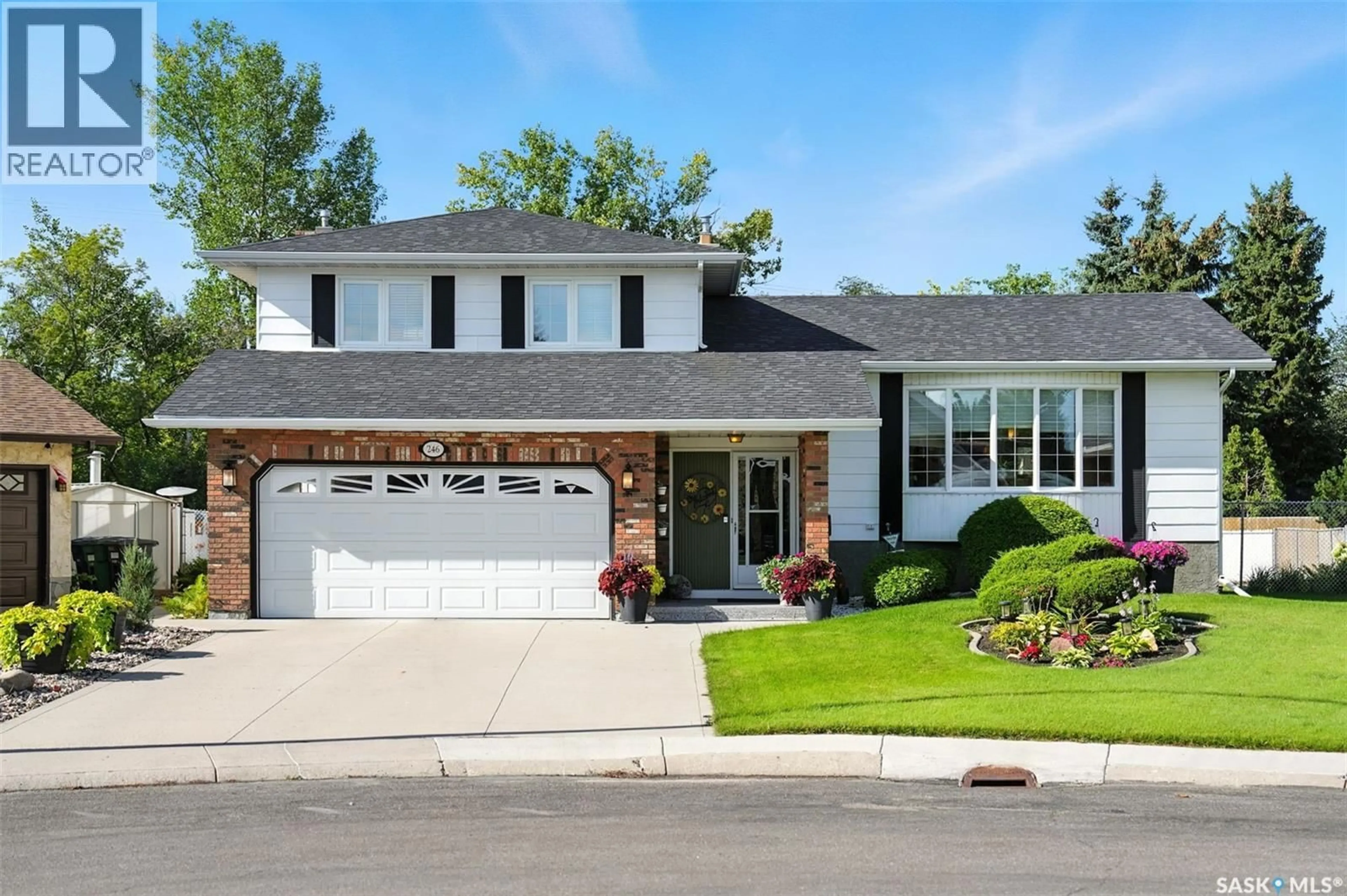 Home with brick exterior material, street for 246 AULD CRESCENT, Saskatoon Saskatchewan S7H4W9