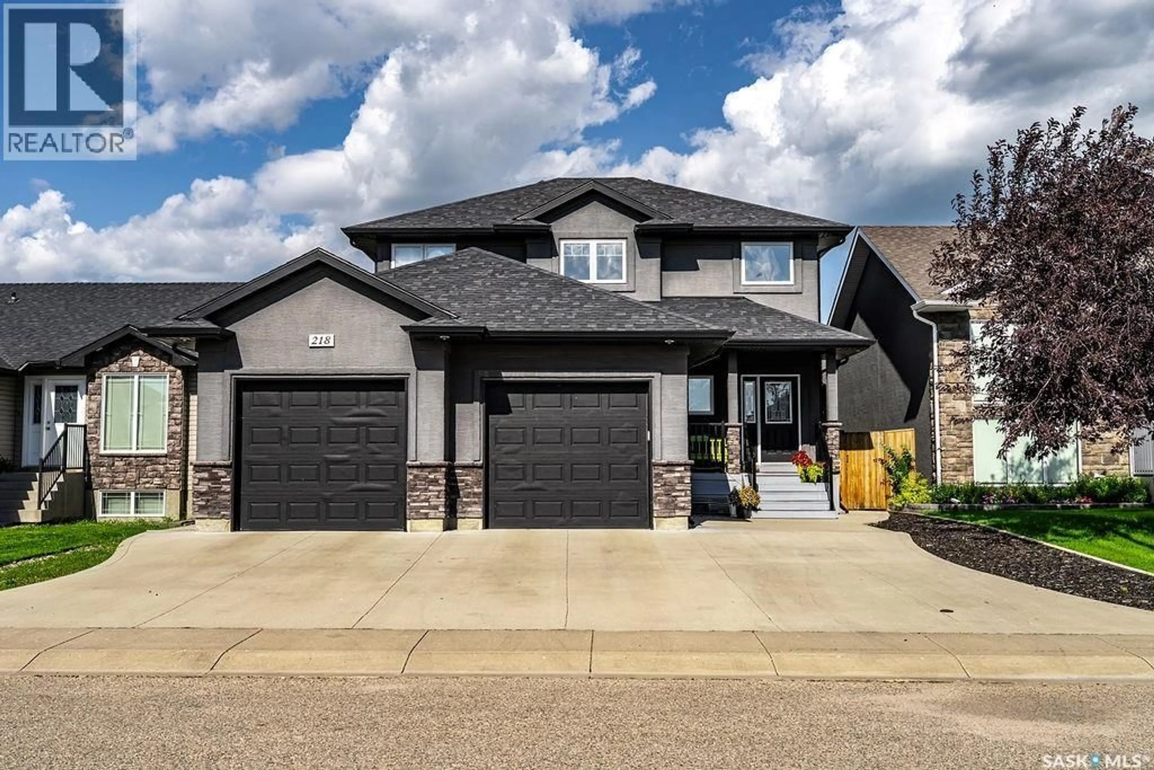 Home with brick exterior material, street for 218 FLEMING CRESCENT, Saskatoon Saskatchewan S7W0E7