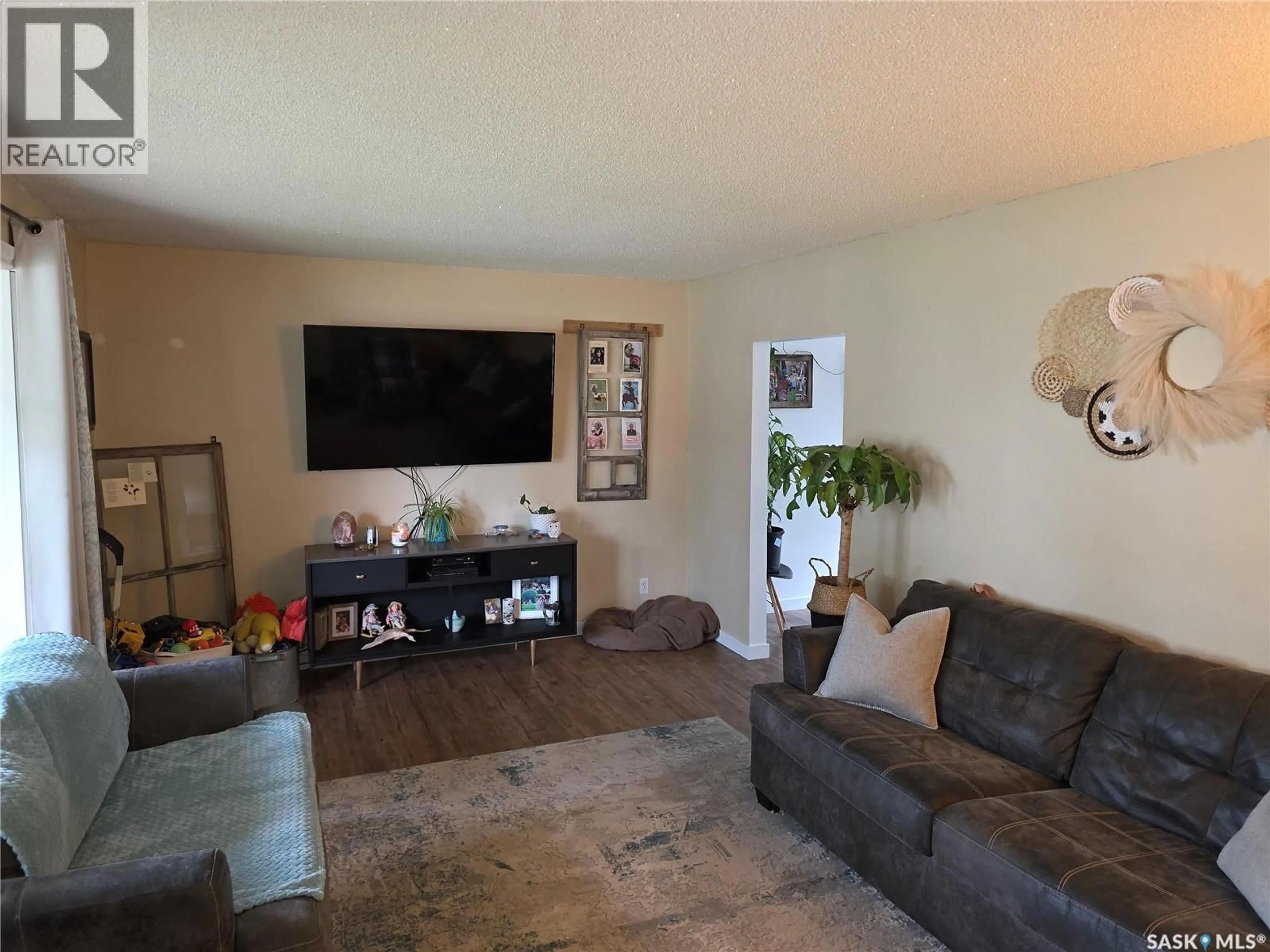 Living room with furniture, unknown for 213 9TH STREET, Wynyard Saskatchewan S0A4T0
