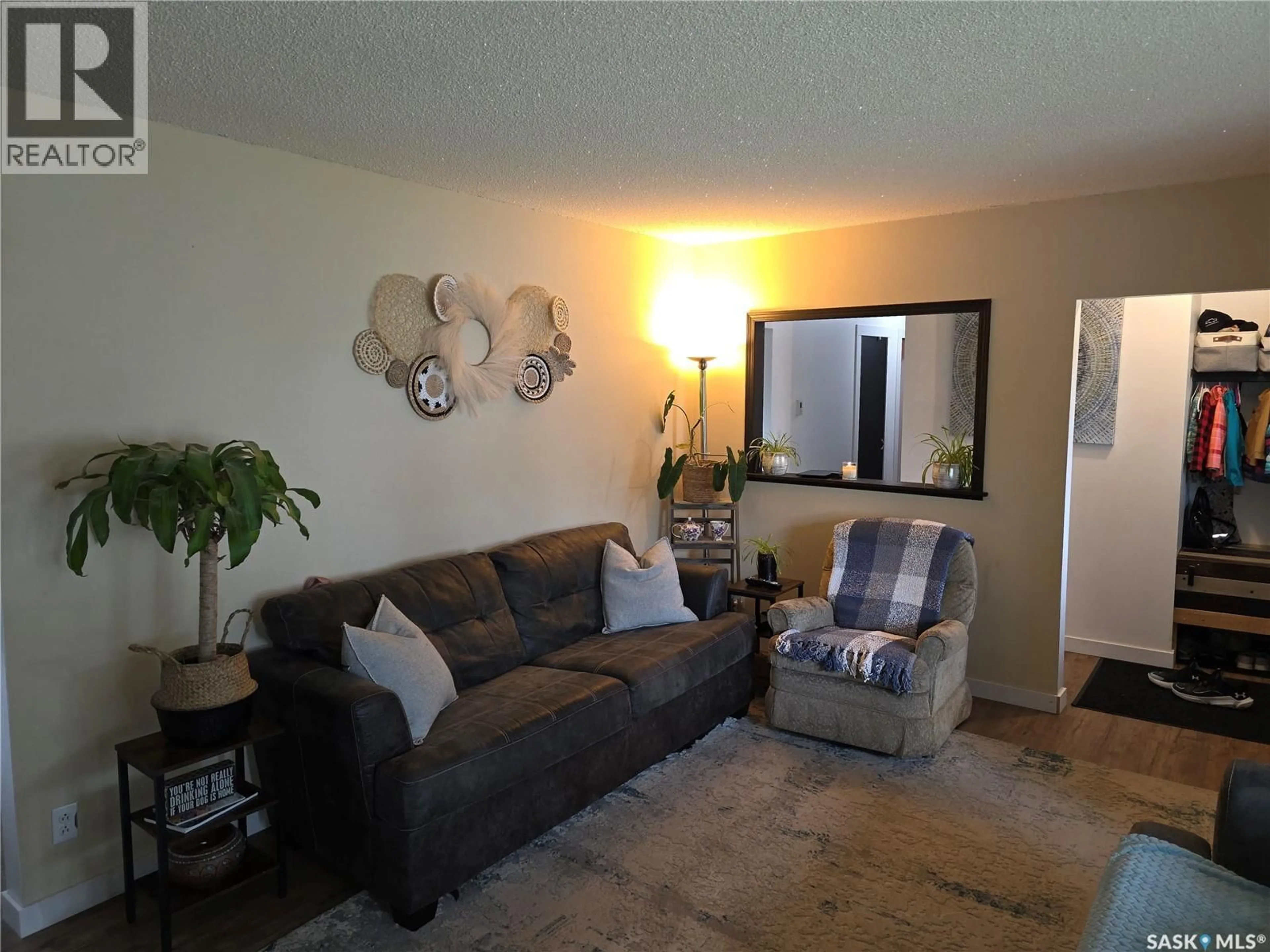 Living room with furniture, unknown for 213 9TH STREET, Wynyard Saskatchewan S0A4T0