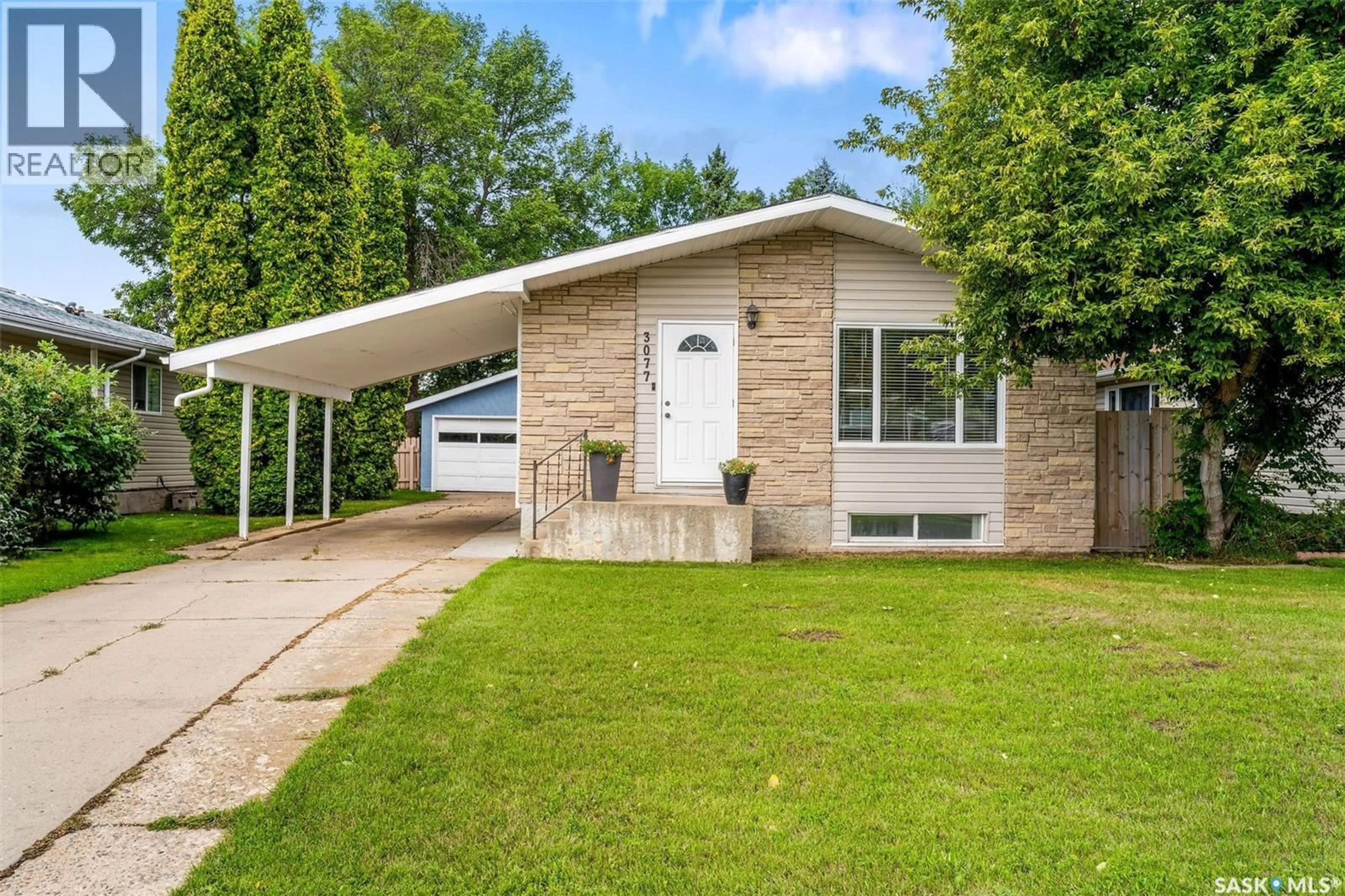 Home with brick exterior material, street for 3077 6TH AVENUE, Prince Albert Saskatchewan S6V5L7
