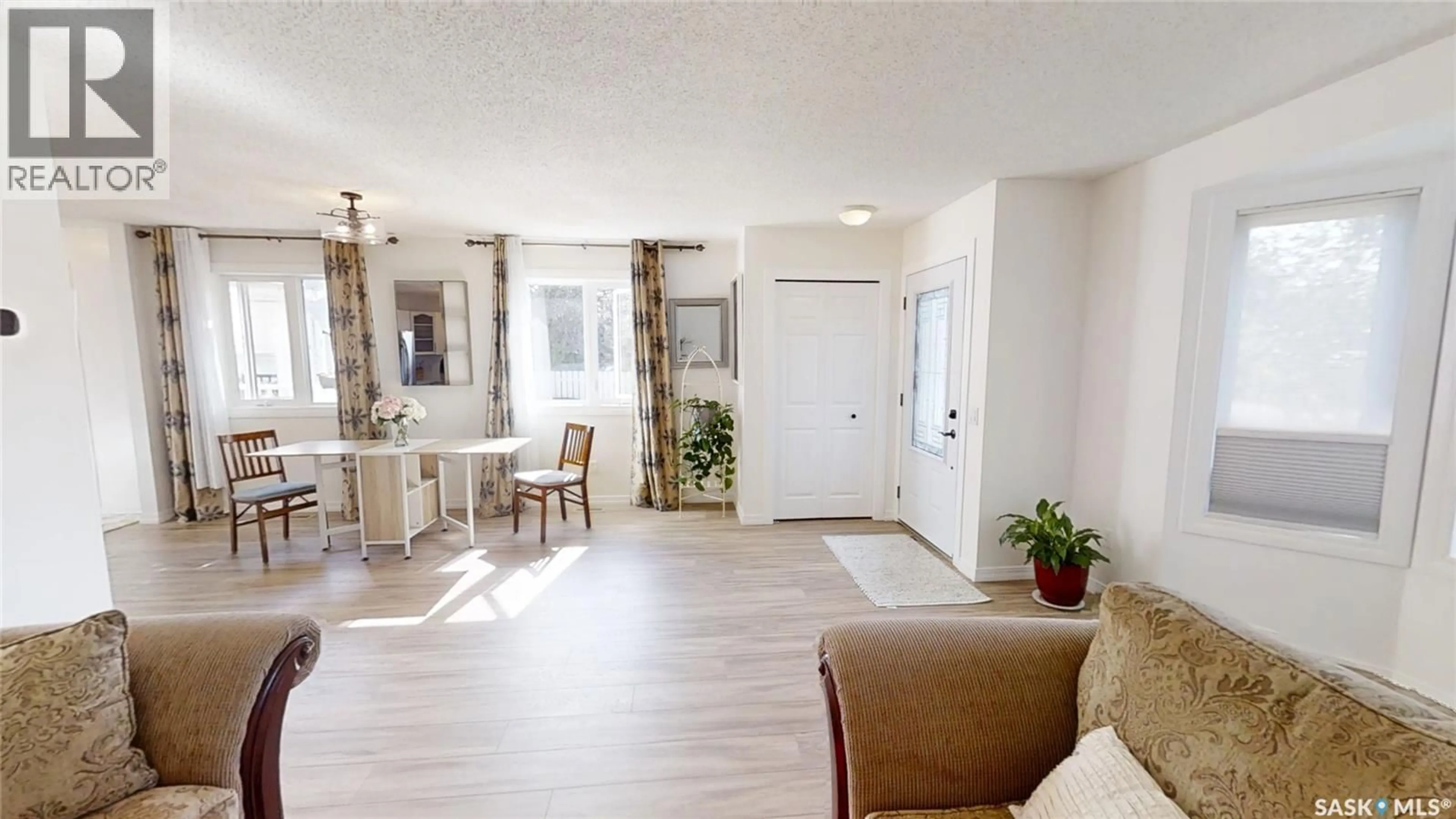 Living room with furniture, unknown for 210 MCCANN WAY, Saskatoon Saskatchewan S7L7A6