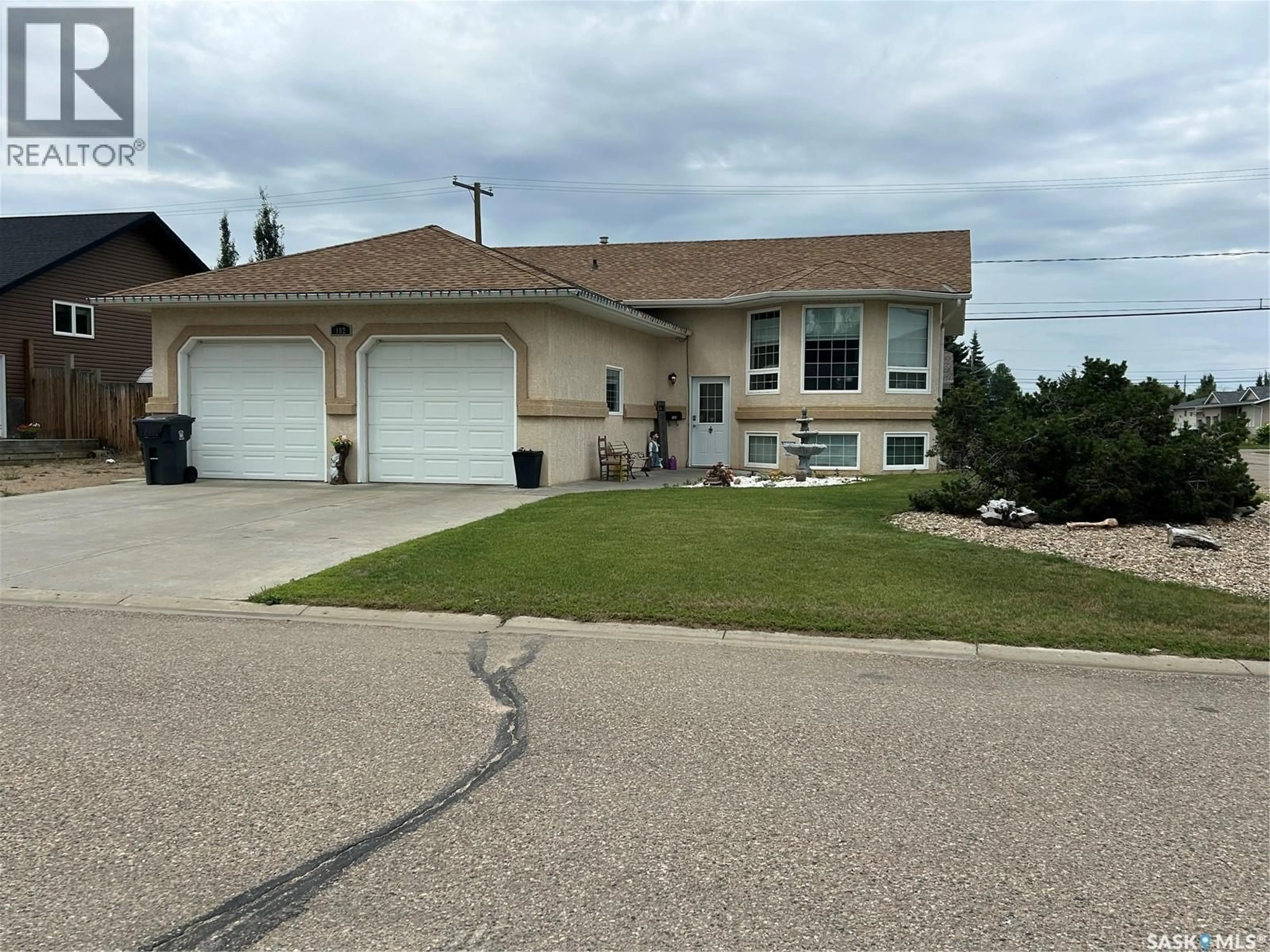 Home with vinyl exterior material, street for 102 15TH STREET, Battleford Saskatchewan S0M0E0