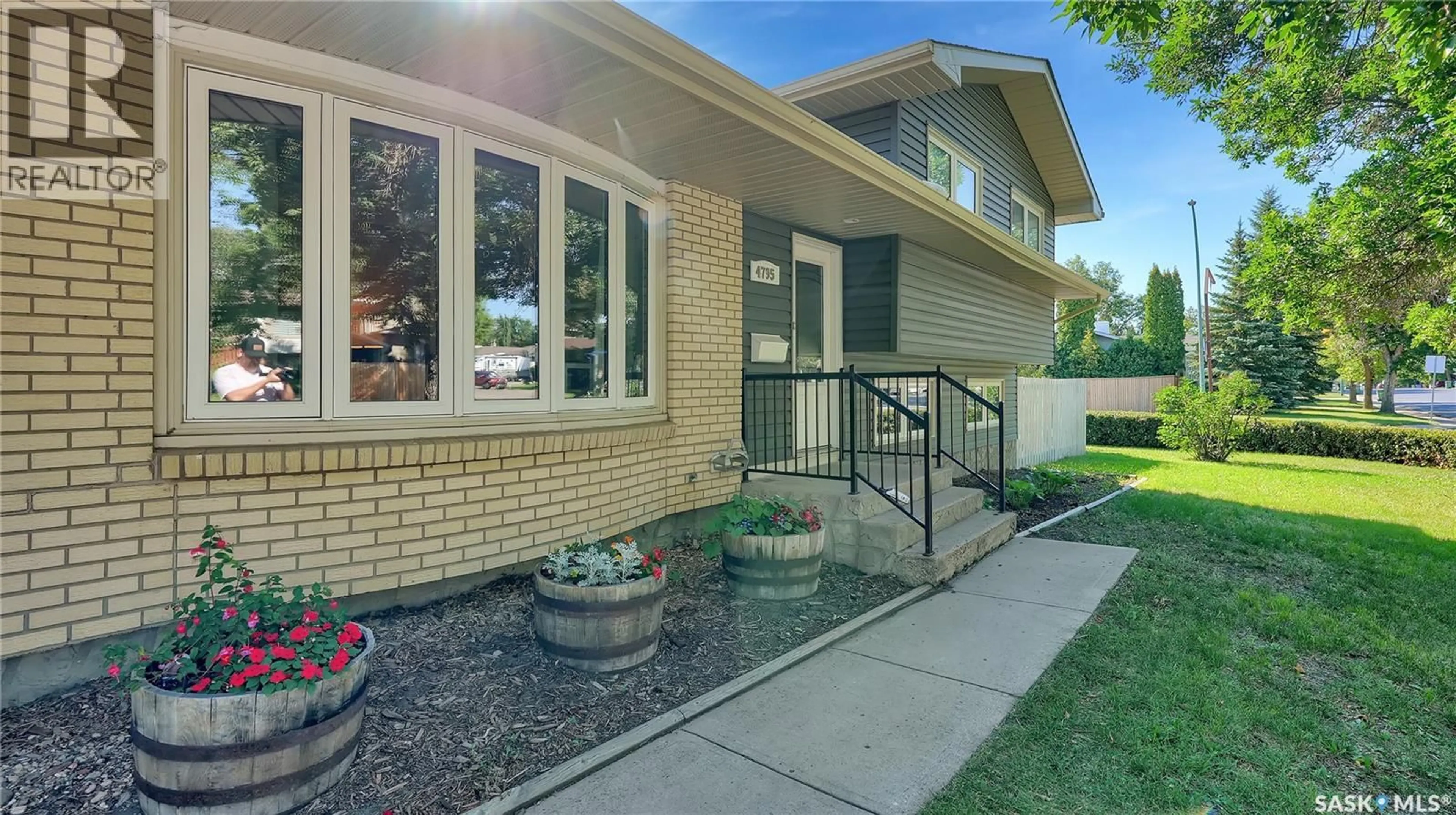 Home with brick exterior material, street for 4795 QUEEN STREET, Regina Saskatchewan S4S6N4
