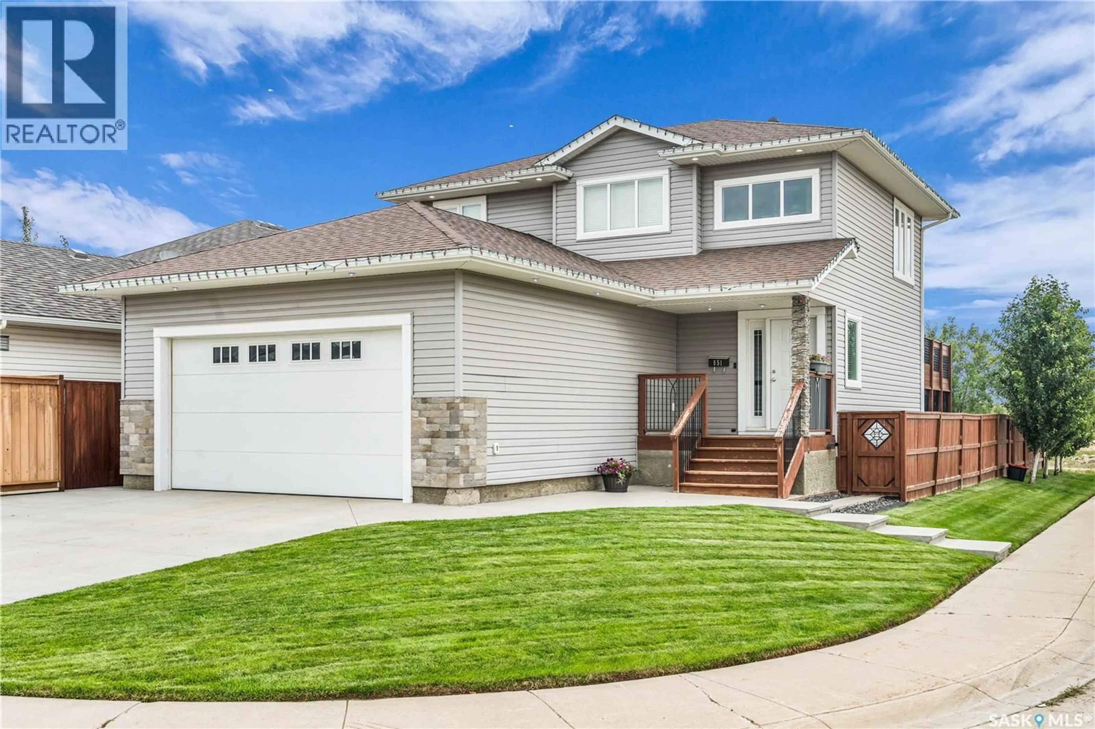 Home with vinyl exterior material, street for 851 CEDAR TERRACE, Martensville Saskatchewan S0K2T2