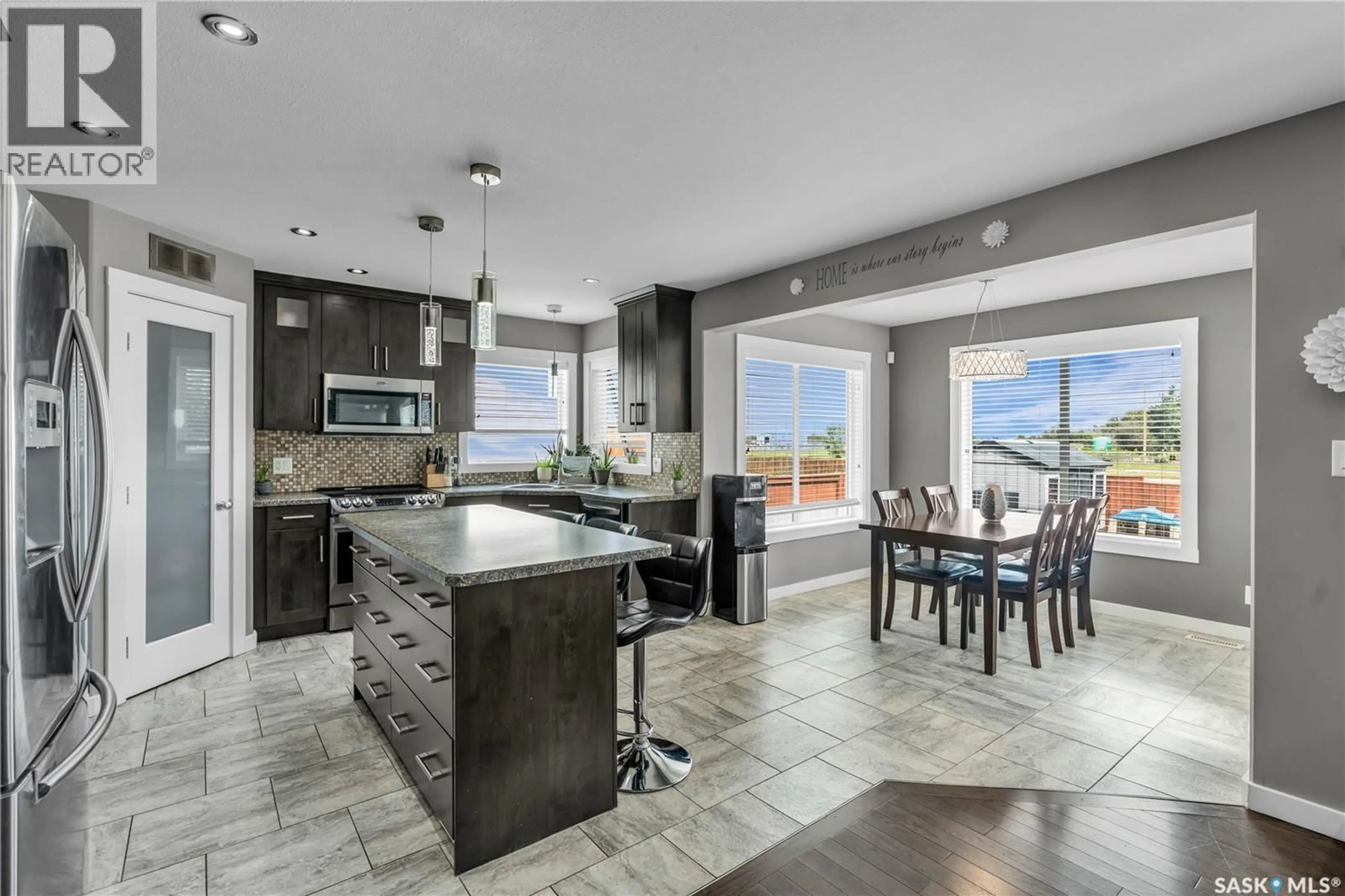Open concept kitchen, ceramic/tile floor for 851 CEDAR TERRACE, Martensville Saskatchewan S0K2T2