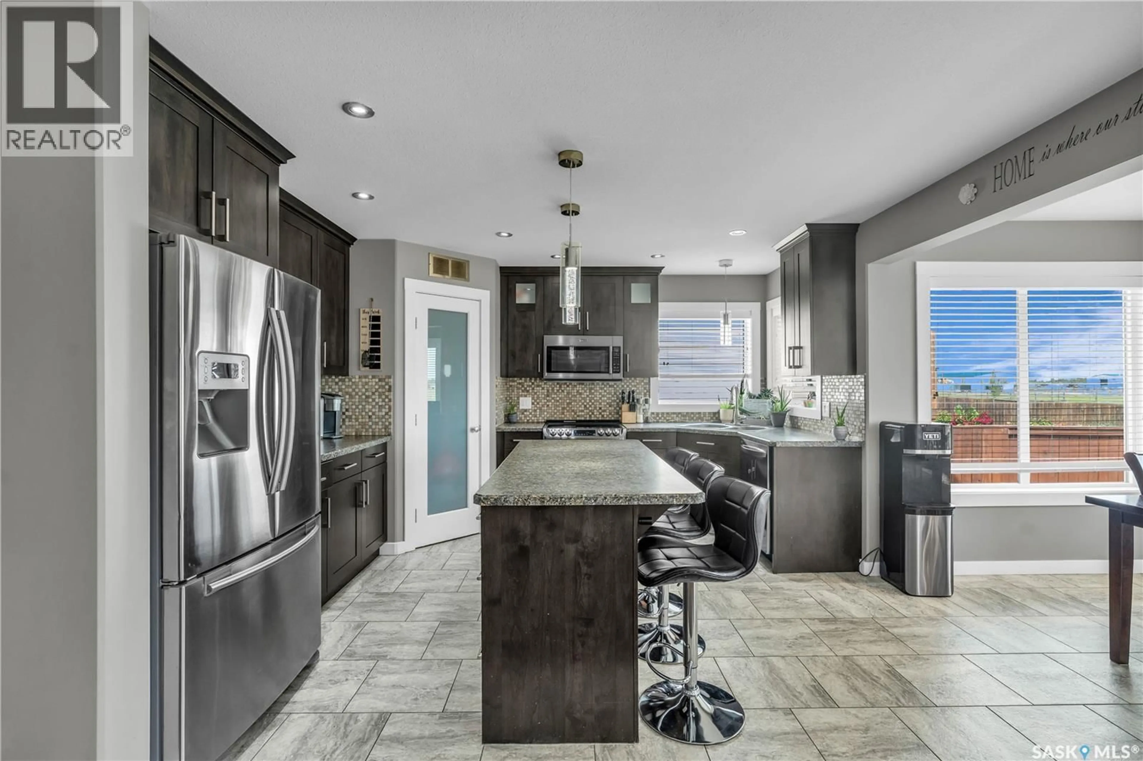 Contemporary kitchen, ceramic/tile floor for 851 CEDAR TERRACE, Martensville Saskatchewan S0K2T2
