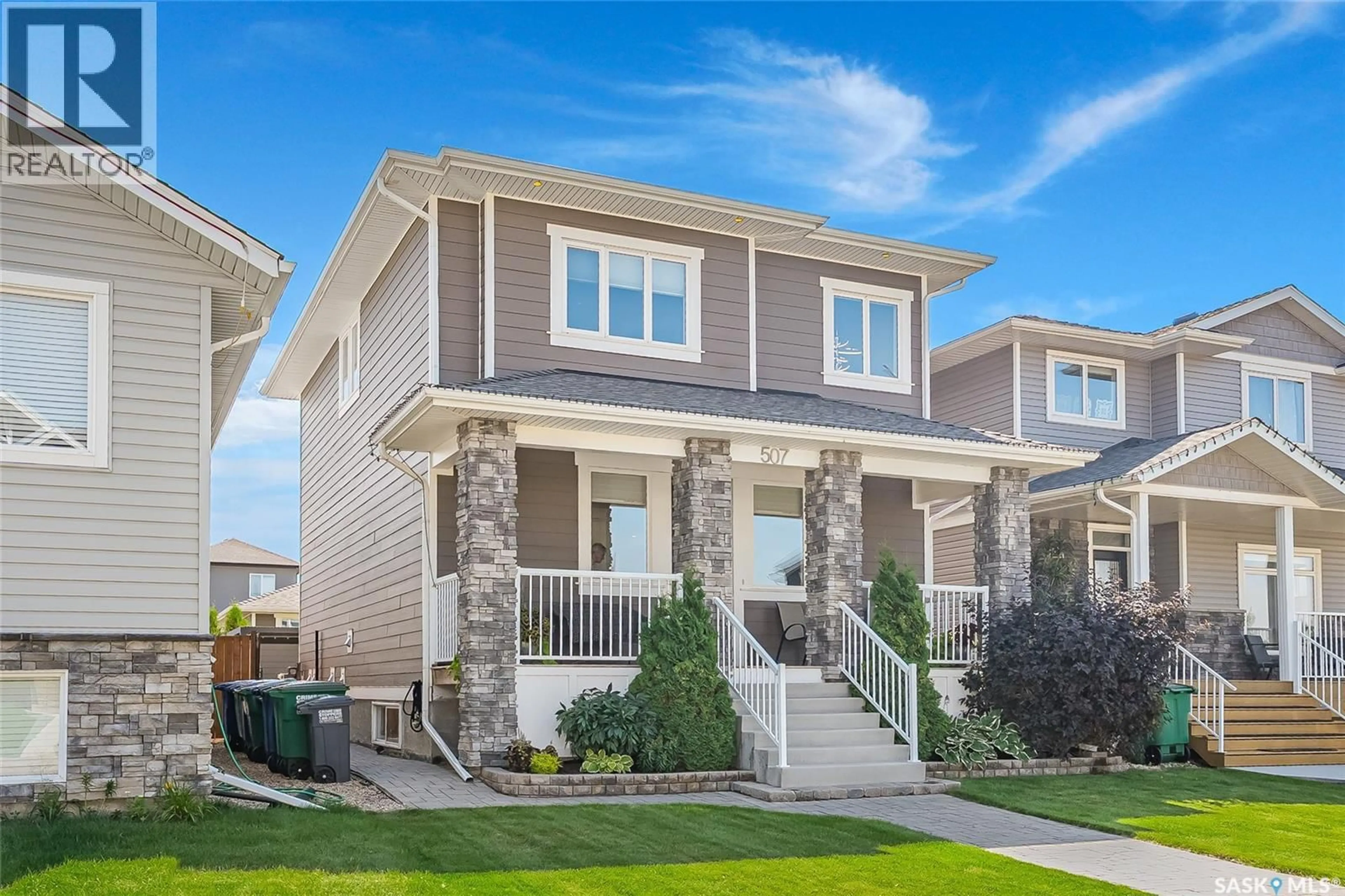Home with vinyl exterior material, street for 507 KLOPPENBURG CRESCENT, Saskatoon Saskatchewan S7W0P1