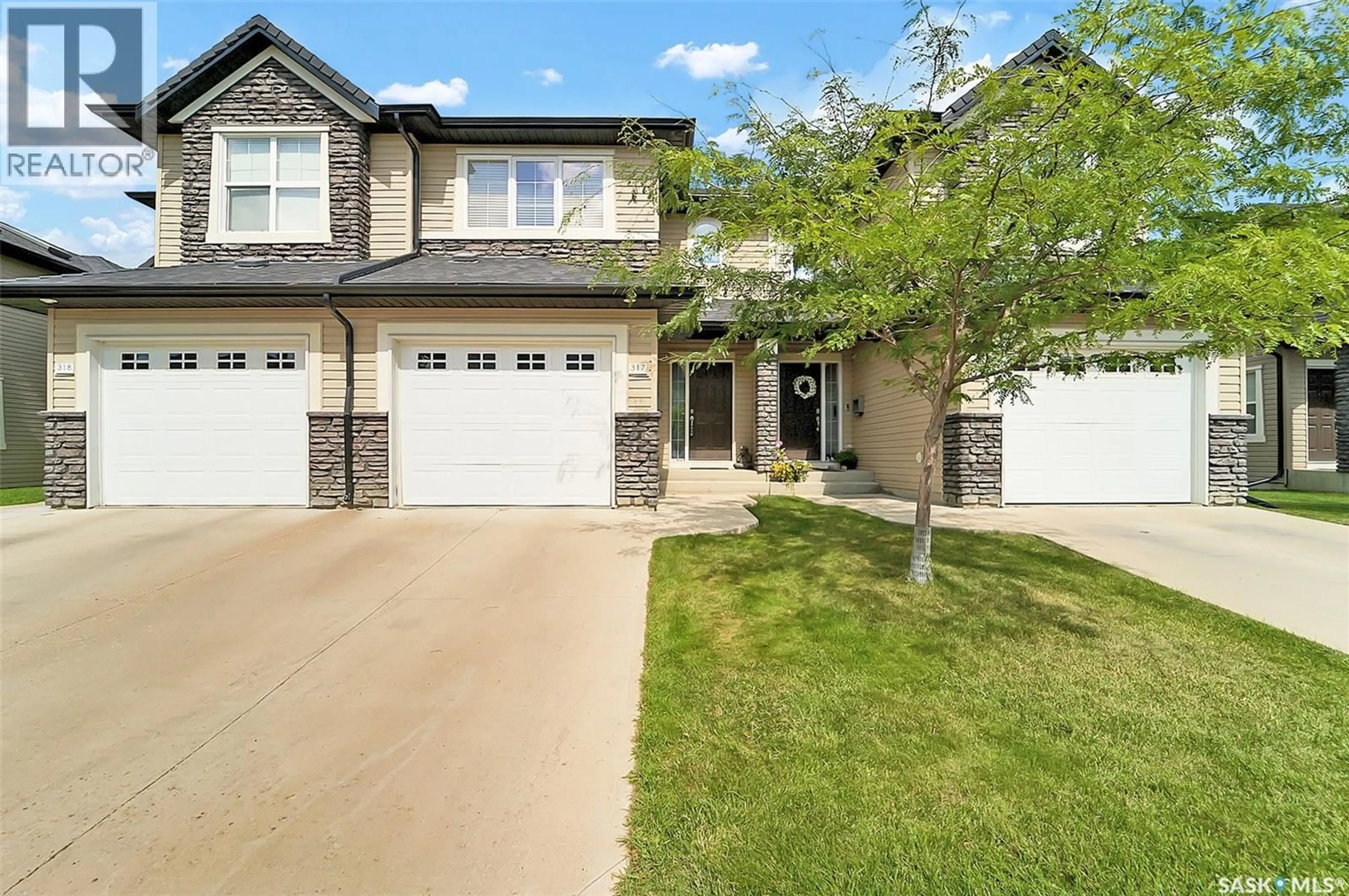 Home with brick exterior material, street for 410 - 317 LEDINGHAM WAY, Saskatoon Saskatchewan S7V0C4