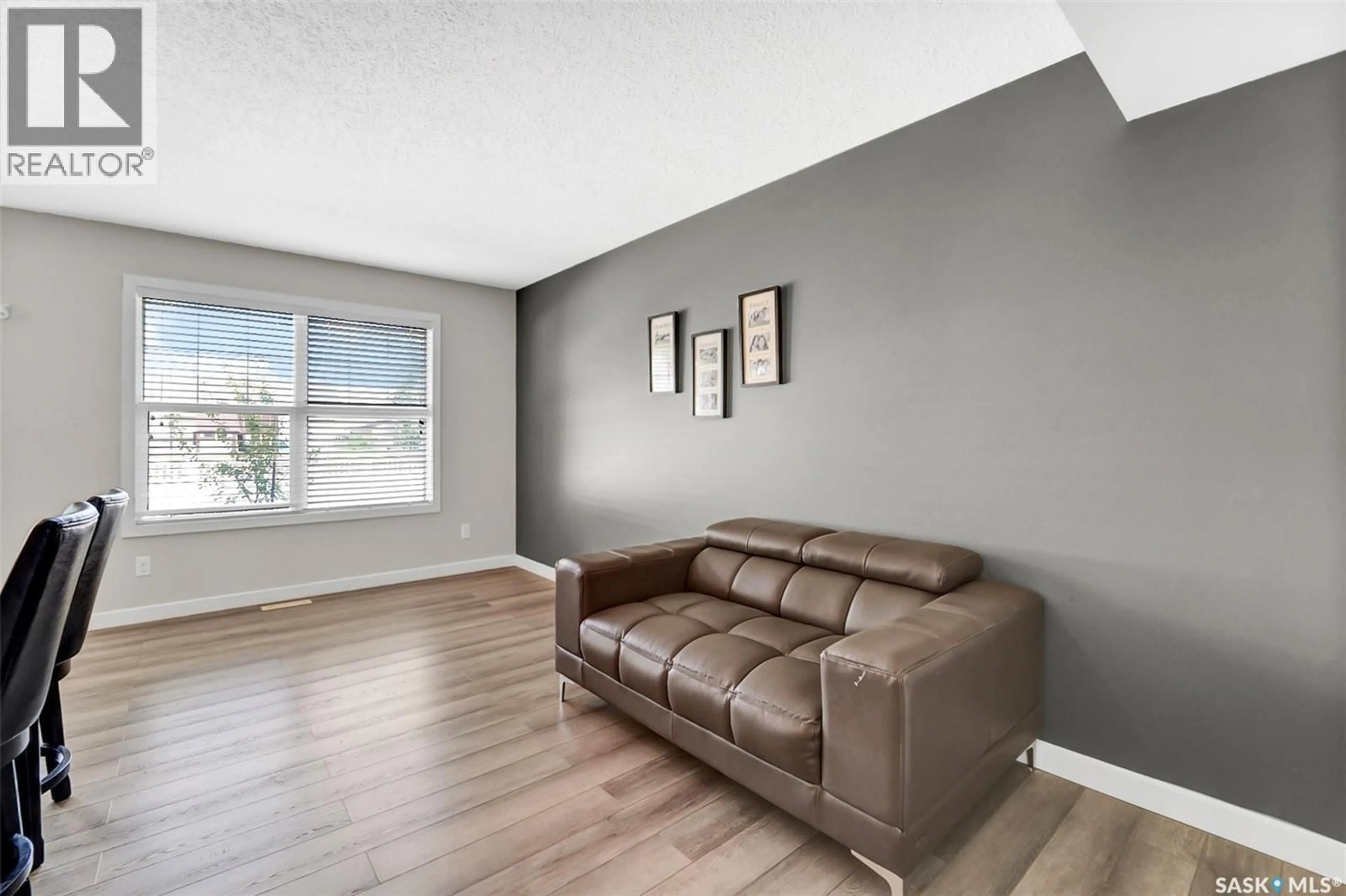 Living room with furniture, unknown for 410 - 317 LEDINGHAM WAY, Saskatoon Saskatchewan S7V0C4